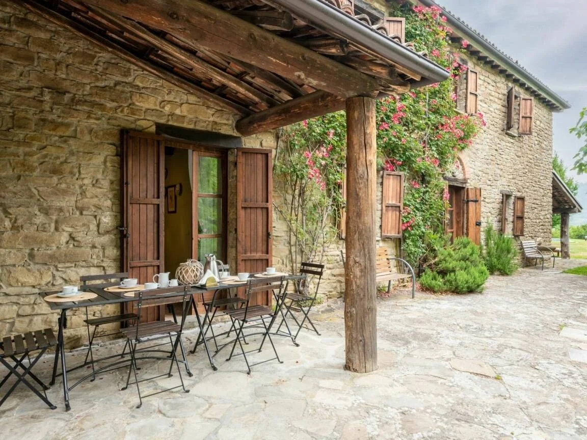 Vacation holiday home, villa for rent with outdoor patio area and surrounded with large private land with orchard, woods and garden.