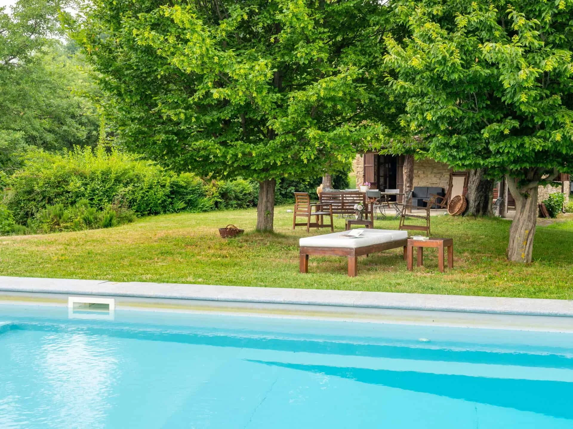 Private garden with a swimming pool in Roccaverano, Piedmont, Asti, Italy.