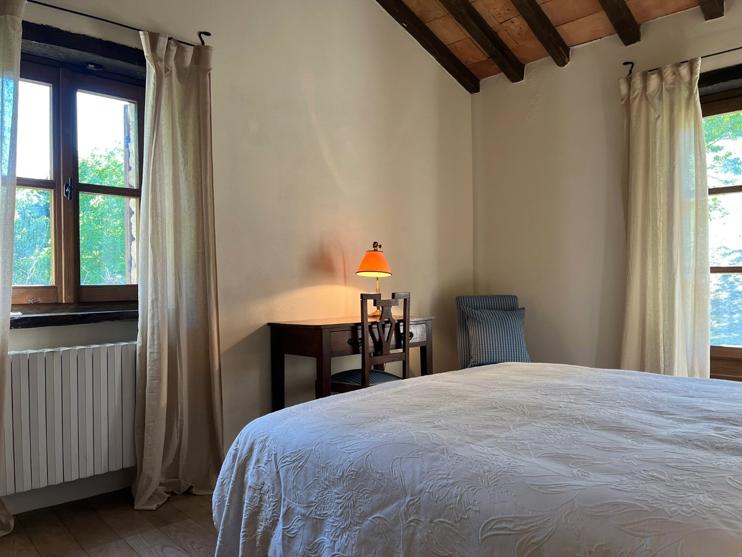 A cozy italian bedroom, interior design, vacation home, vacation rental