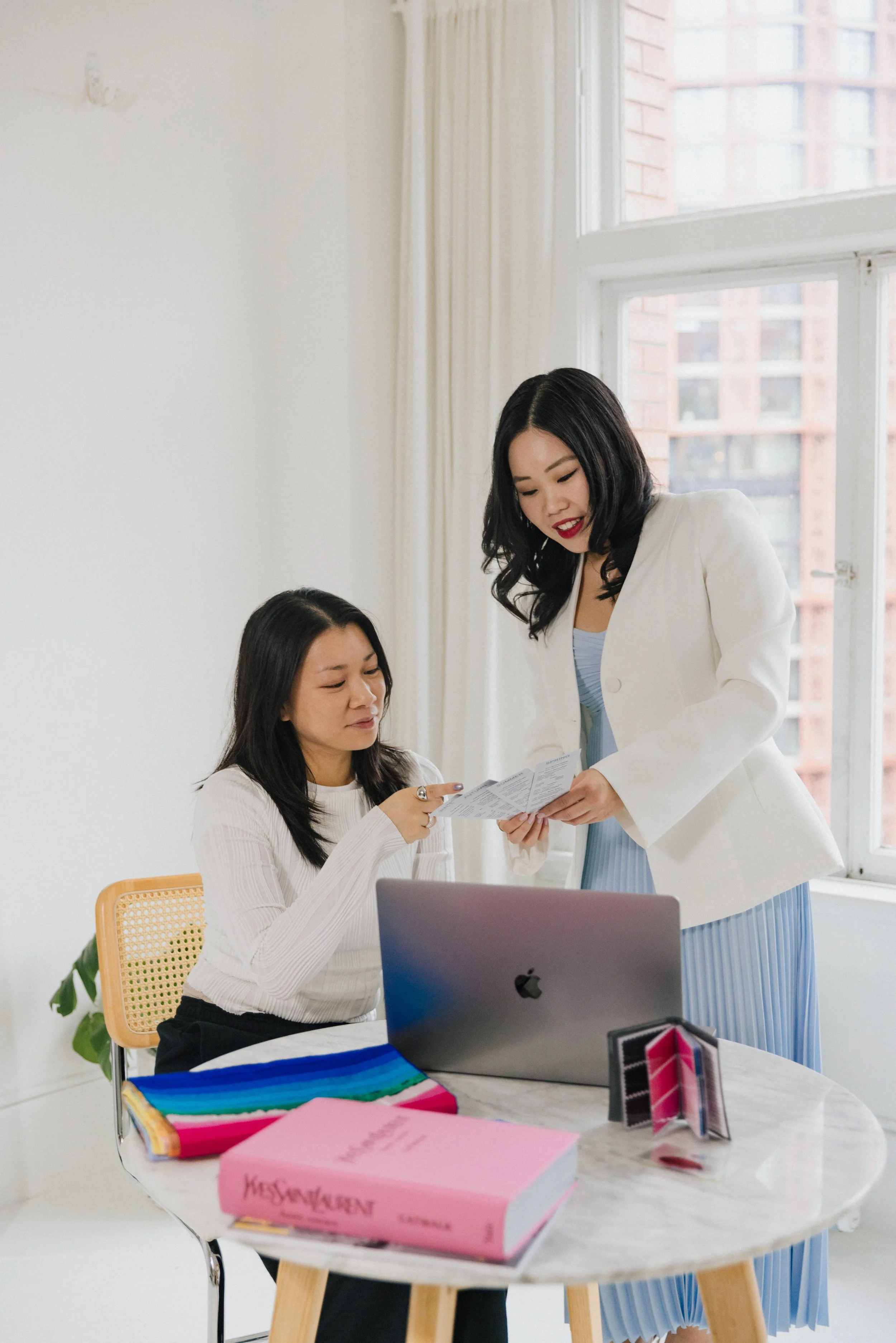 Colour To Style body and personl style analysis session in Vancouver, discussing body proportions, style direction, and wardrobe recommendations with a client.