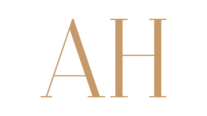 Stylized text reading 'A H' in beige color on a black background.