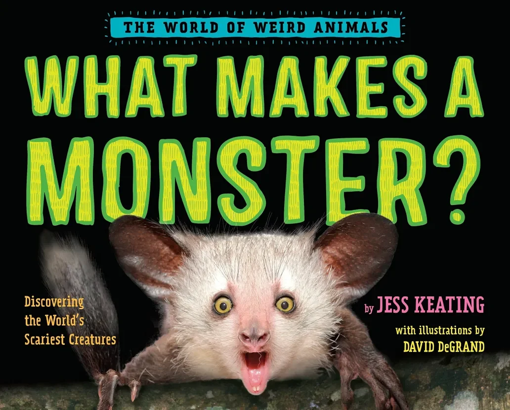 Book cover titled 'What Makes a Monster?' featuring a creature with large ears, yellow eyes, pink nose, and a surprised expression.
