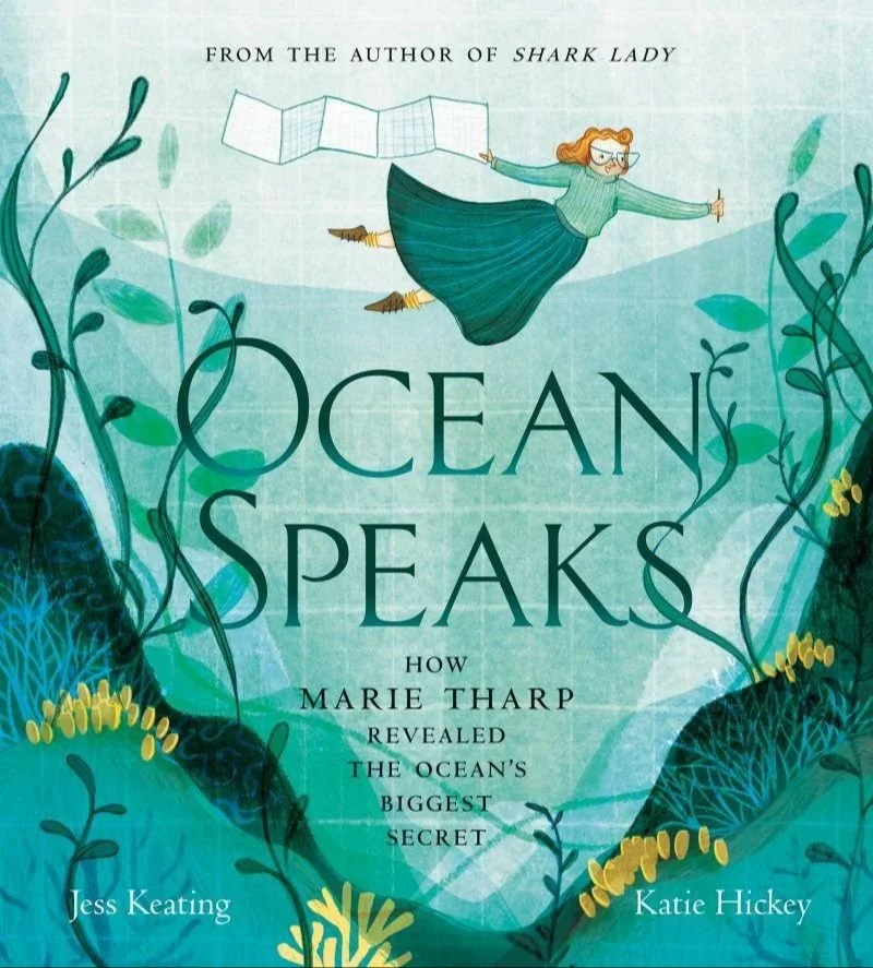 Book cover for 'Ocean Speaks' by Jess Keating and Katie Hickey, featuring an illustration of a woman with glasses and curly red hair, holding a map while floating underwater among seaweed and coral.