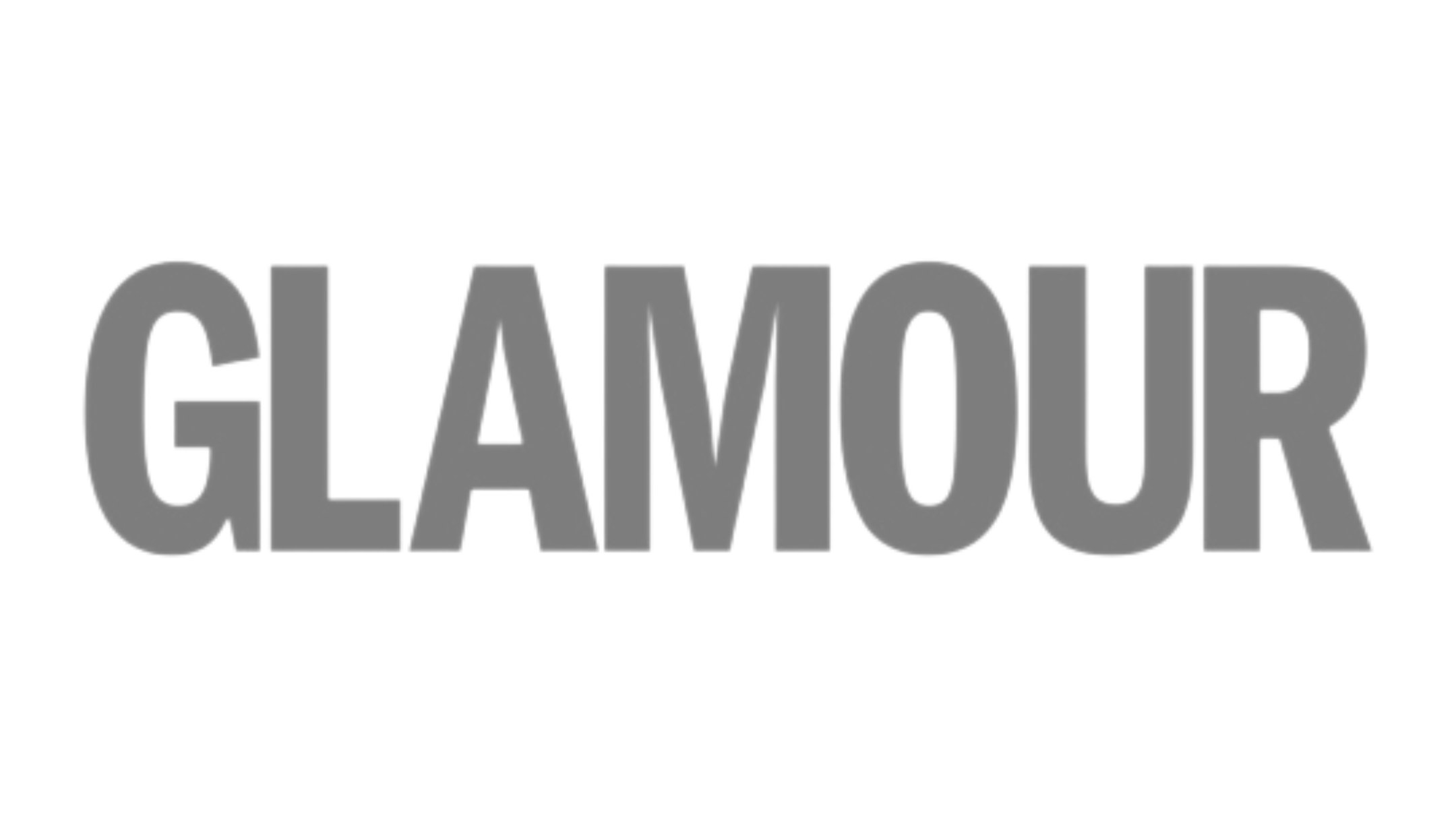Glamour magazine logo in black, white, and gray text.