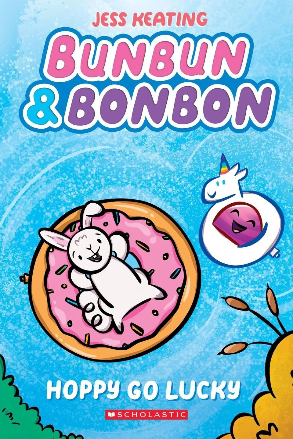 Colorful children's book cover titled "BUNBUN & BONBON" by Jess Keating, featuring a smiling bunny with a pink frosted donut-like head and a cheerful unicorn with a rainbow horn, against a blue background with a decorative yellow element at the bottom right.
