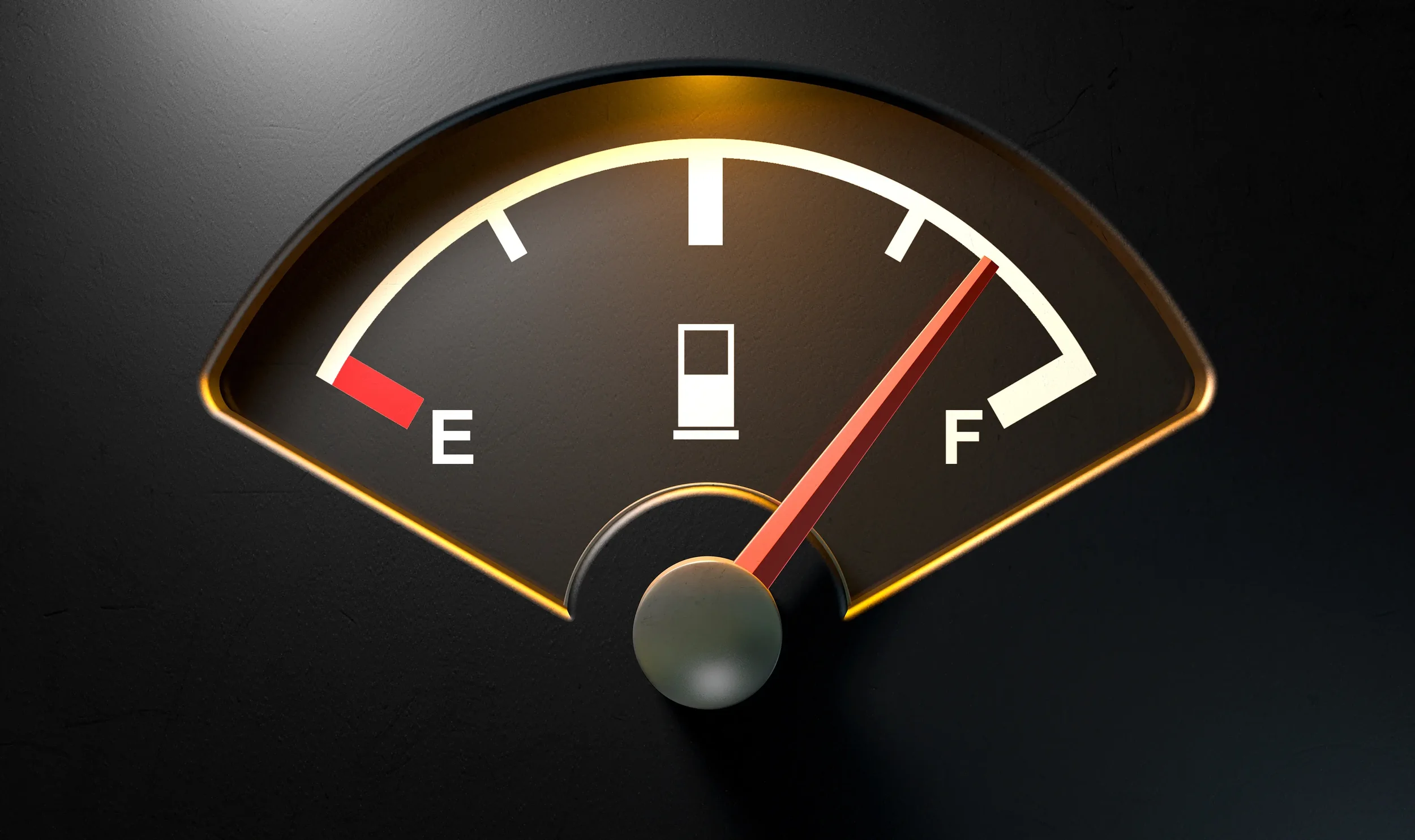 A car fuel gauge showing the tank is full with the needle pointing to 'F'.