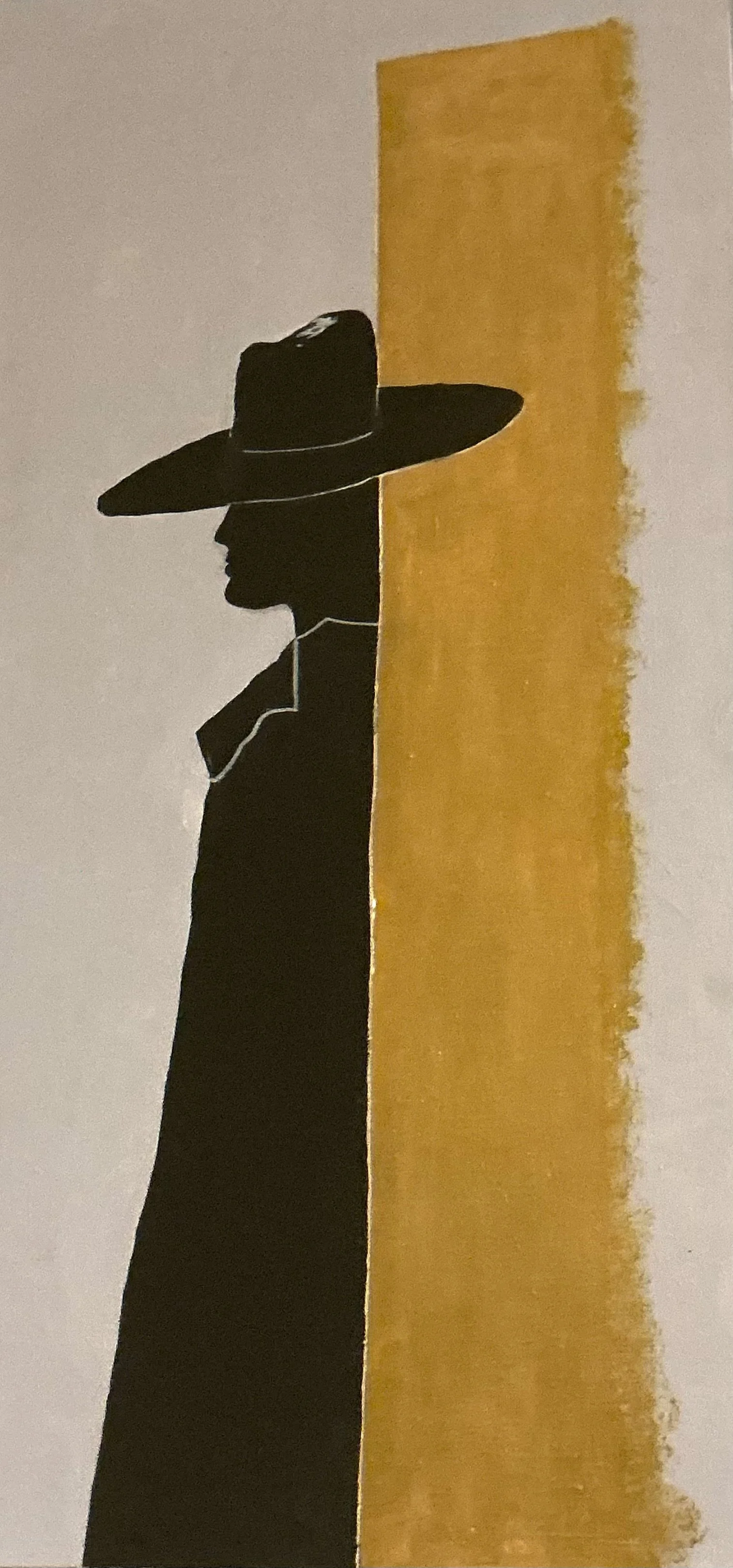 Silhouette of a person wearing a hat and earphones, standing next to a vertical yellow-orange painted section of a wall.