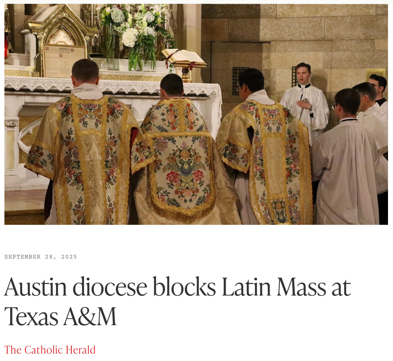 Metal sign on a brick wall showing 'TEXAS A&M' with a star, rifle, and other symbols.