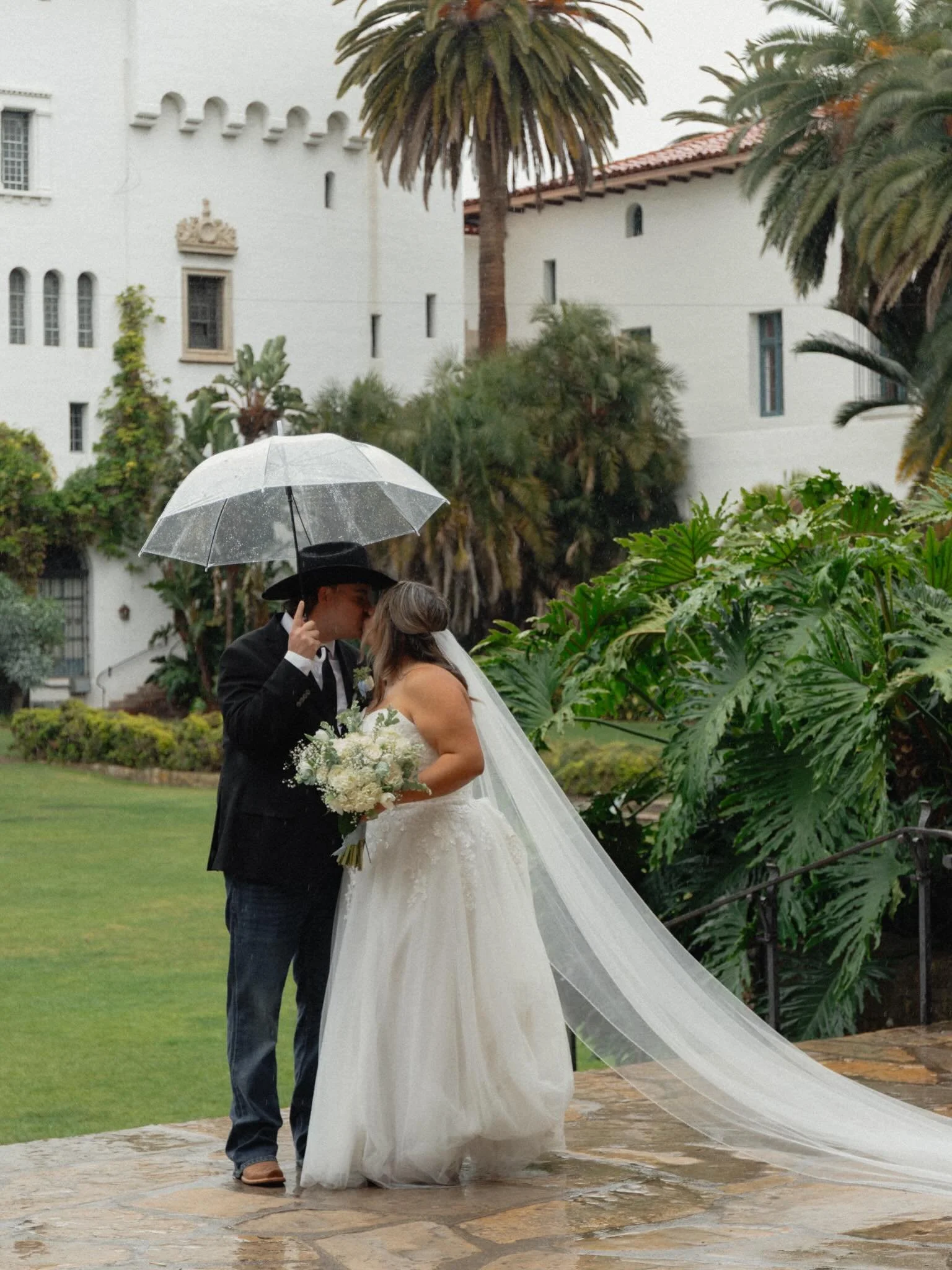 They say if it rains on your wedding day it is good luck. Well, the luck poured down on these two and it was absolutely MAGICAL! 

#weddingdayrain #clearumbrella #brideandgroom #engaged2027