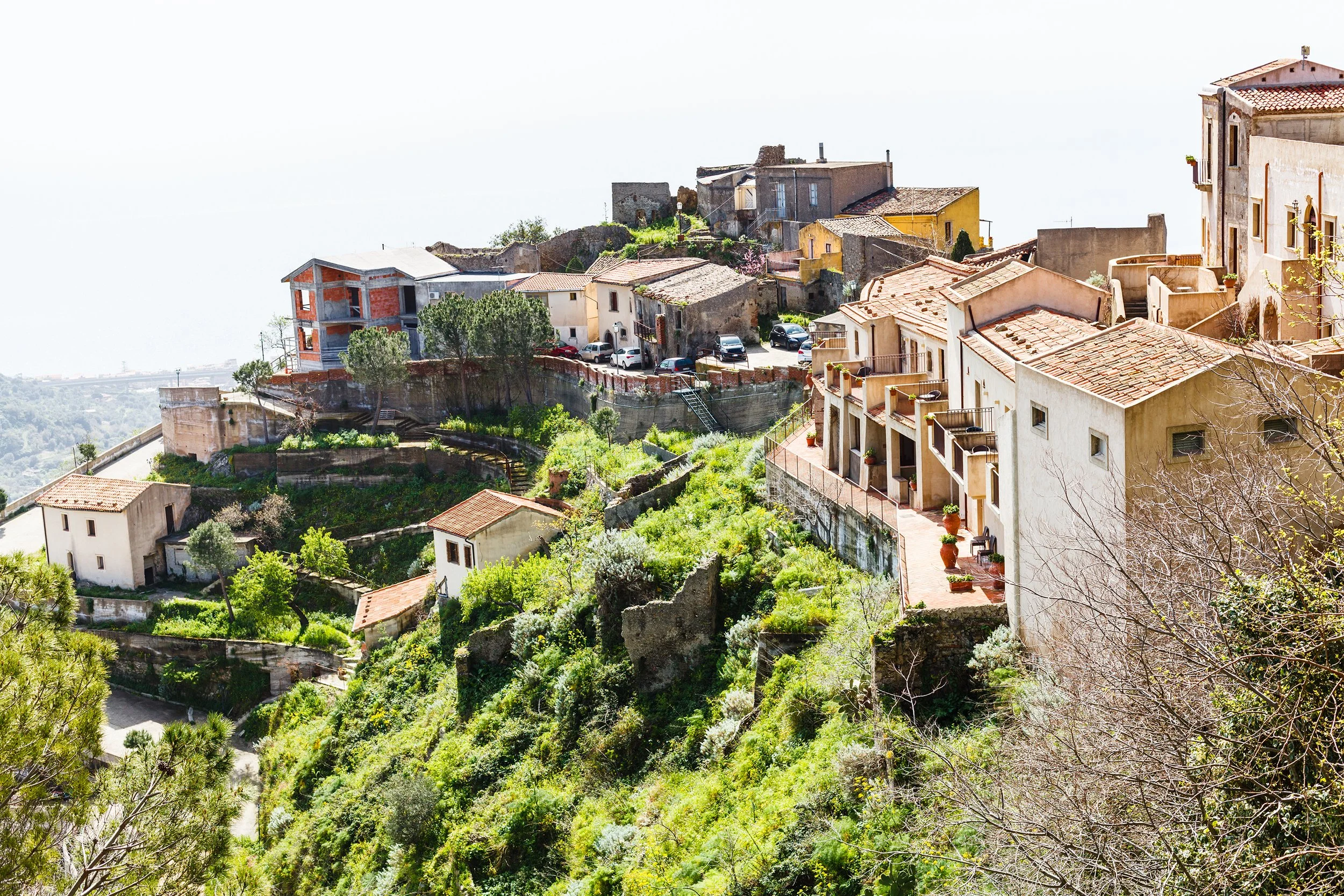 vecteezy_houses-in-mountain-village-savoca-in-sicily_12245151.jpg