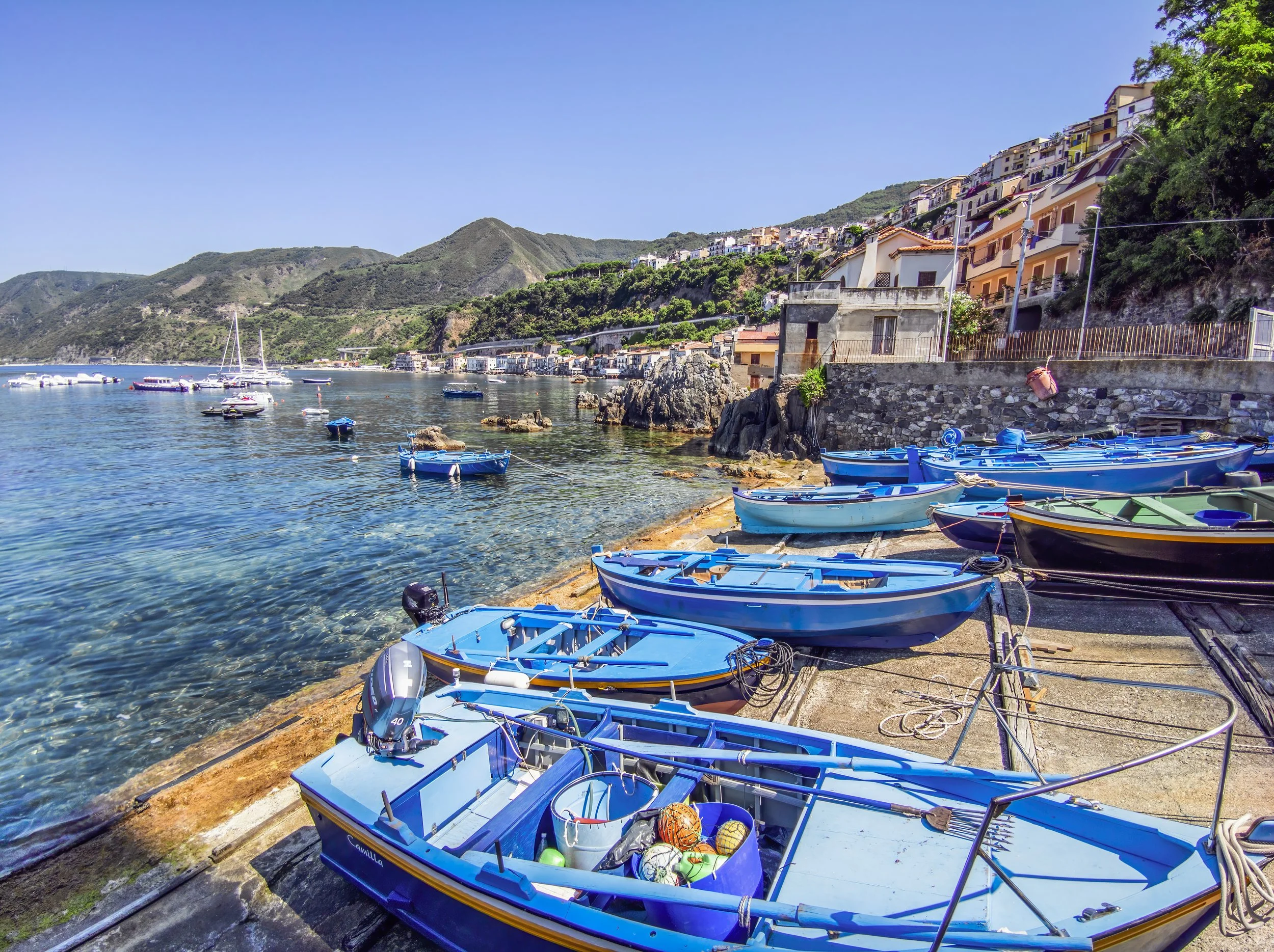 vecteezy_calabria-tourist-port-of-scilla-with-small-boats-and-typical_13310675.jpg