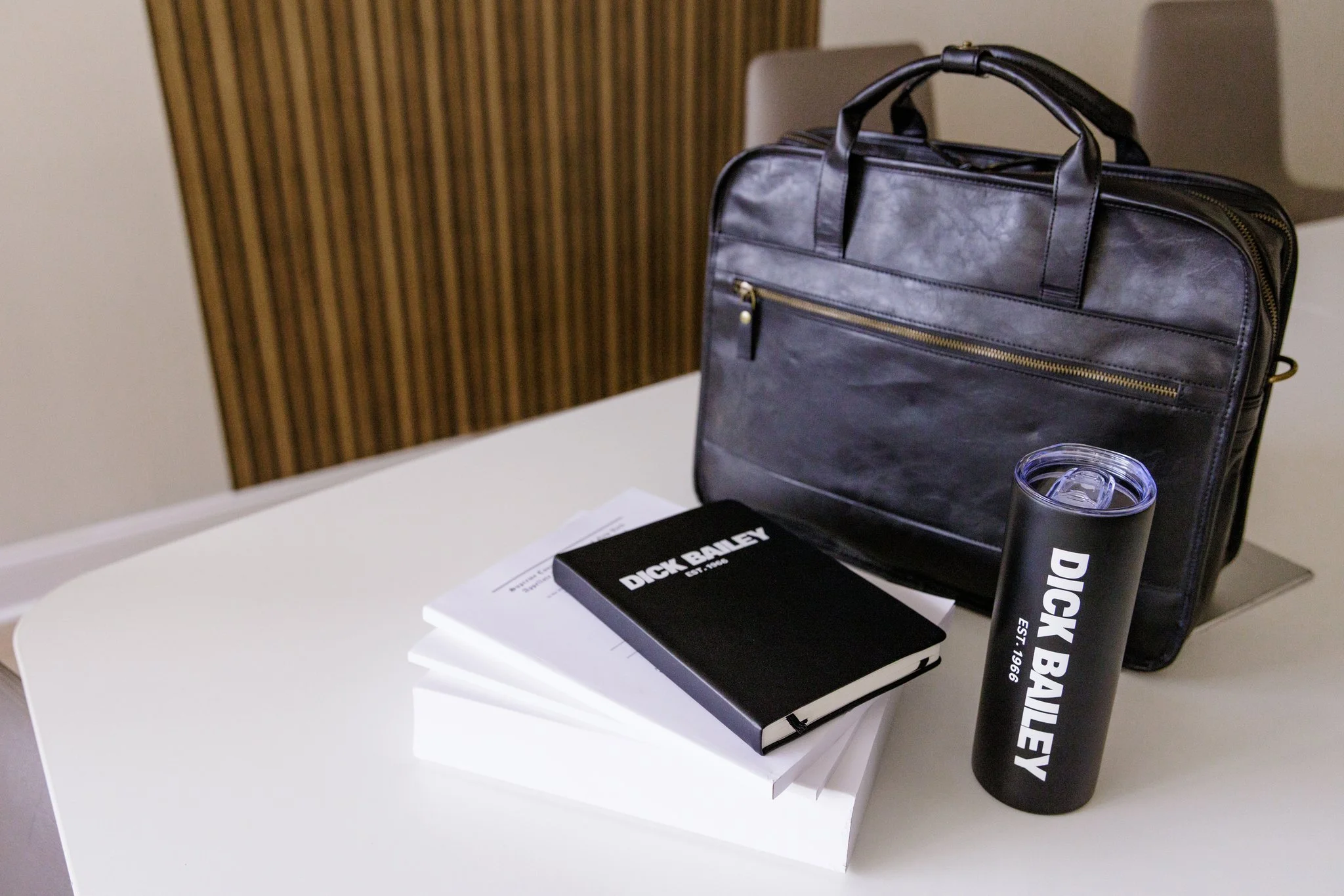 Dick Bailey Service journal, coffee cup, and appellate briefs representing legal resources for attorneys