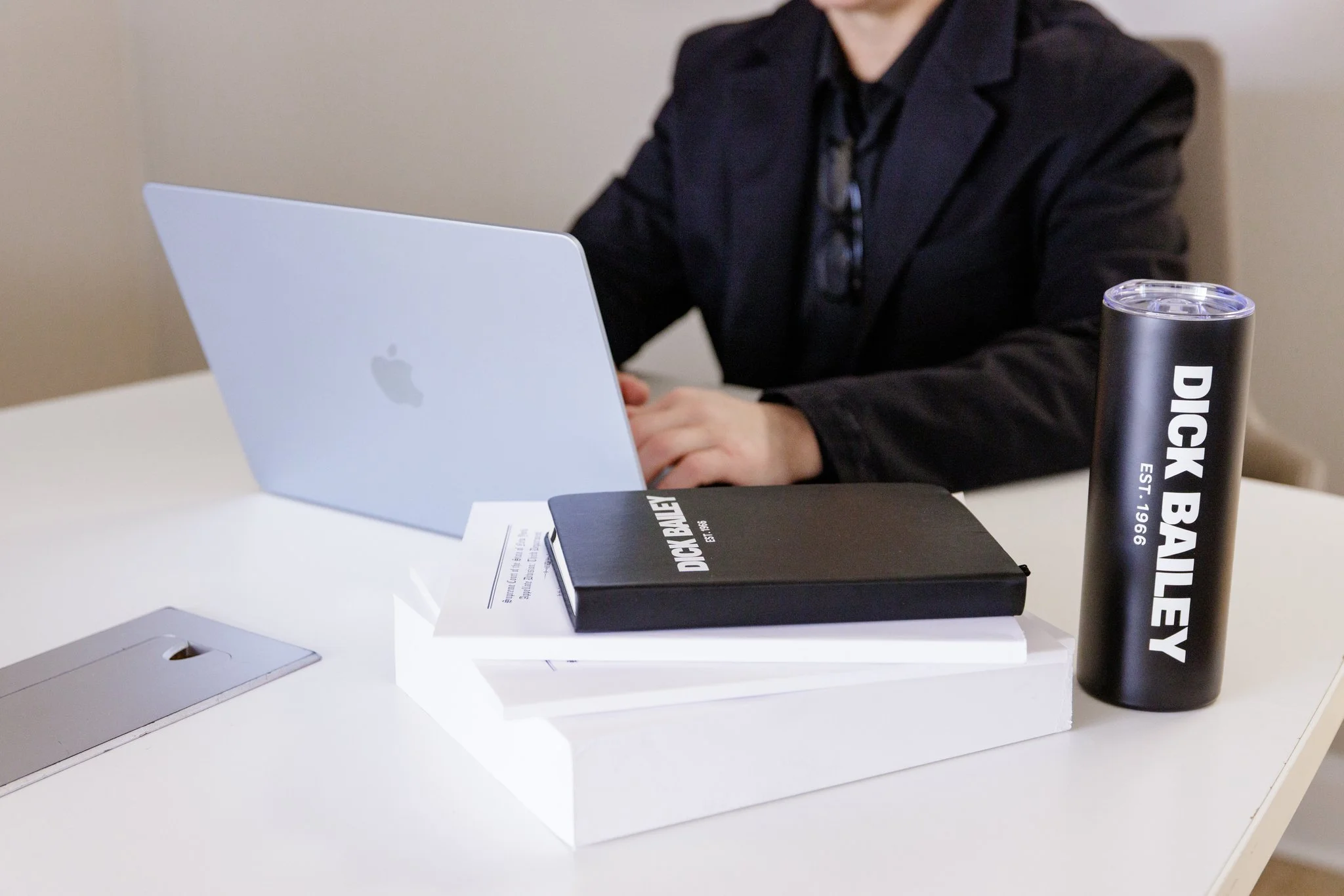 Dick Bailey Service team member preparing appellate documents at desk
