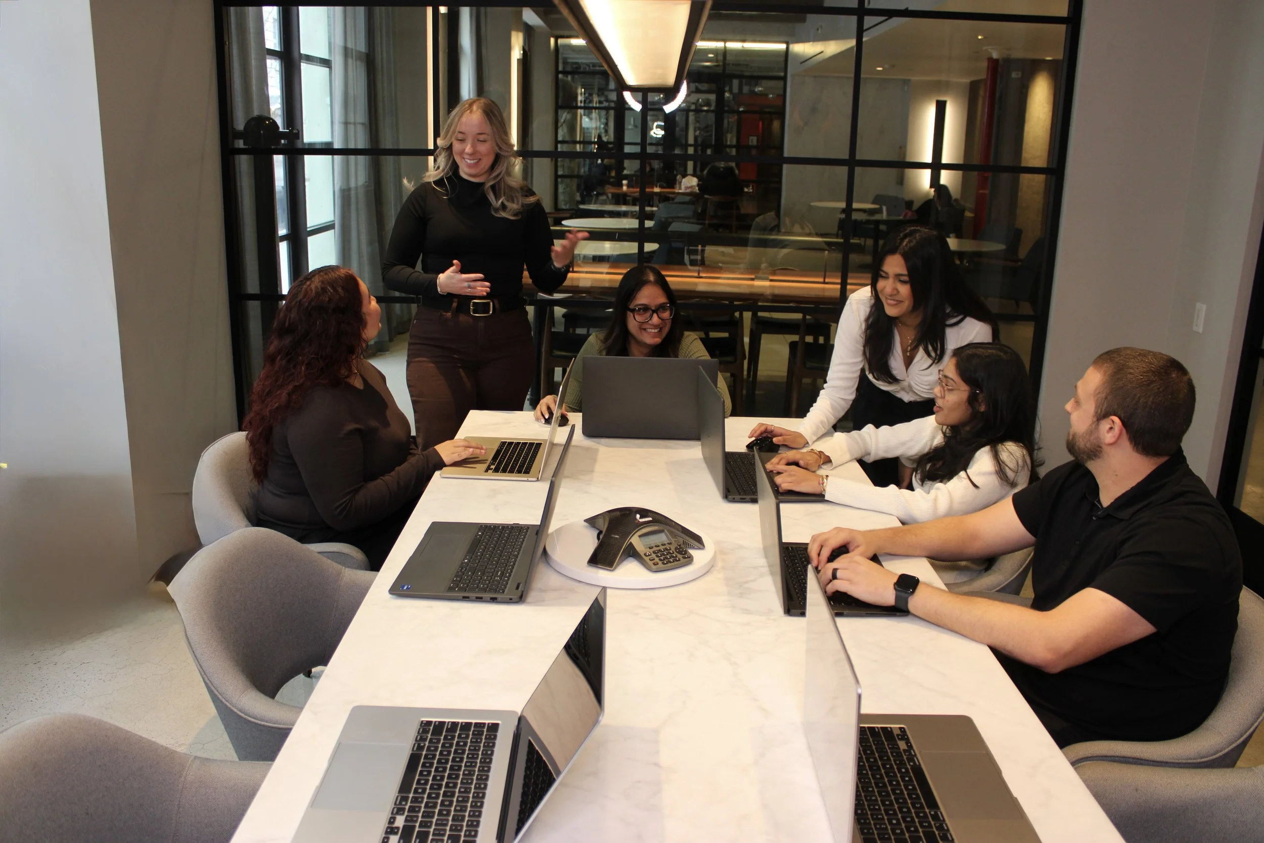 Dick Bailey Service team working together in modern office