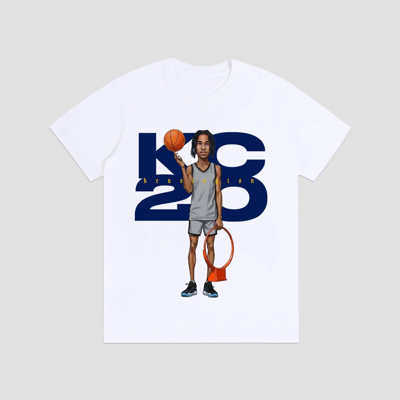 White T-shirt with a cartoon illustration of a basketball player holding a basketball and a hoop, with large blue text reading 'KC 20' in the background.
