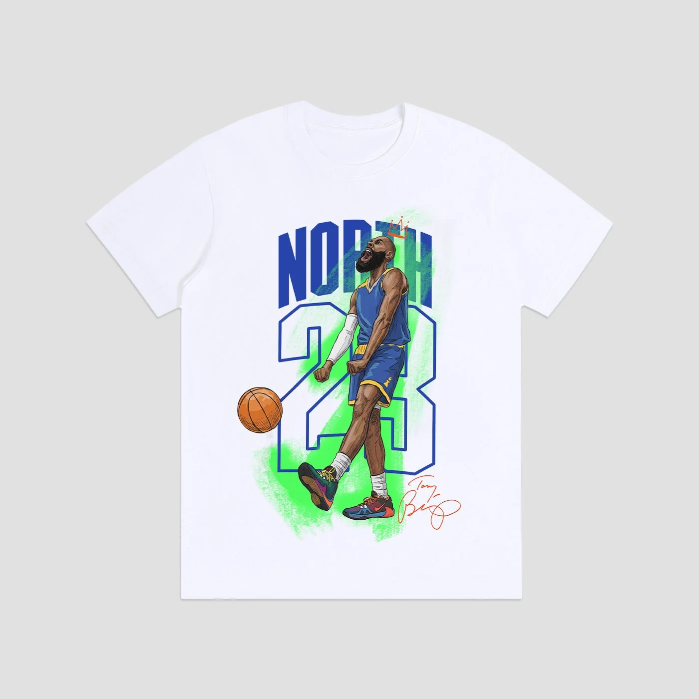 White T-shirt with a colorful illustration of basketball player with a beard, wearing a blue and yellow uniform, dribbling a basketball. The background features large blue and green numbers '23' and the word 'North'. There is an orange signature at the bottom right.