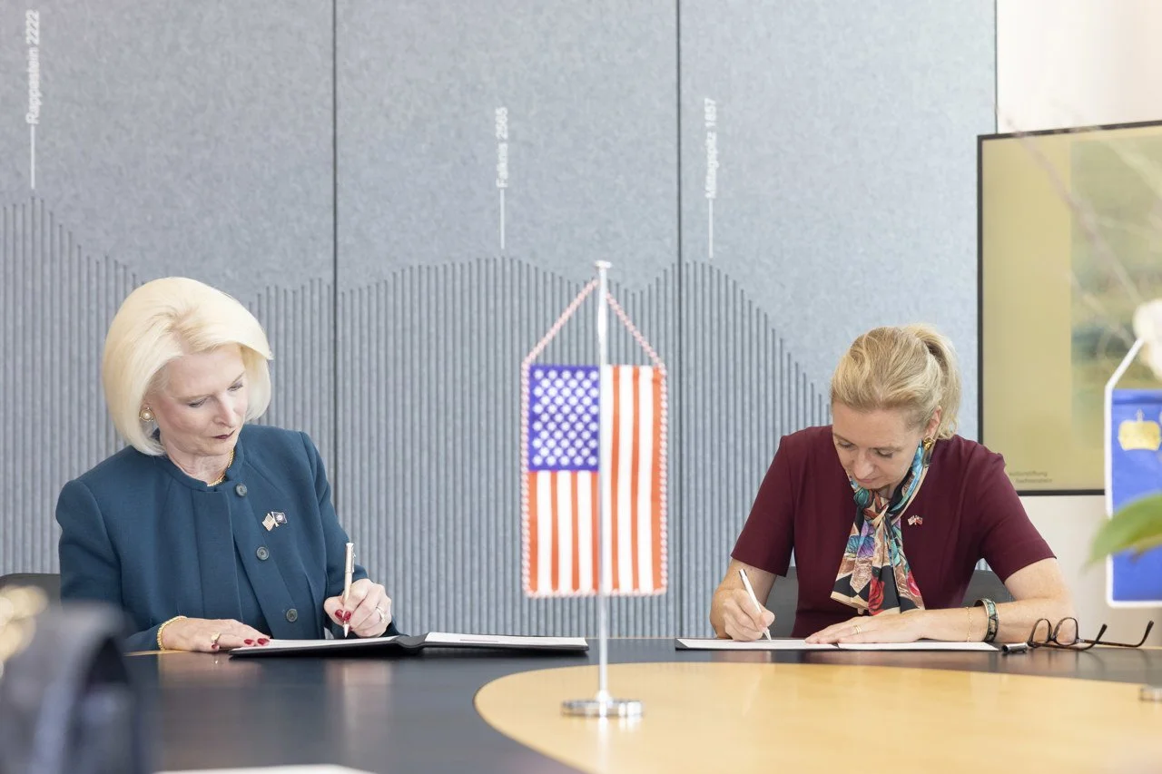 Signing Agreement.jpg
