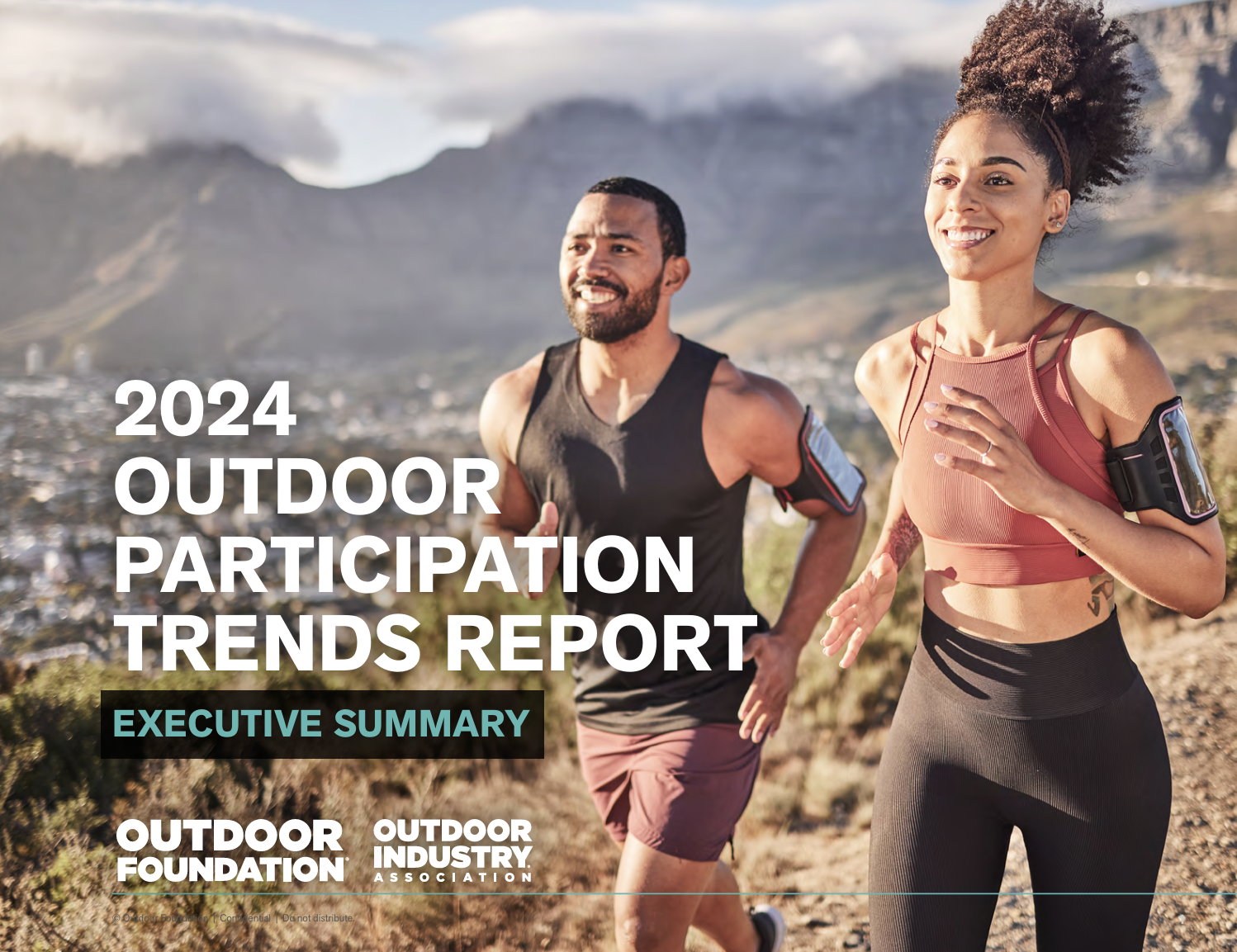 Two people jogging outdoors on a hilly trail with mountains and a city in the background, featured on a report cover titled '2024 Outdoor Participation Trends Report' by the Outdoor Foundation and Outdoor Industry Association, with a subtitle 'Executive Summary'.