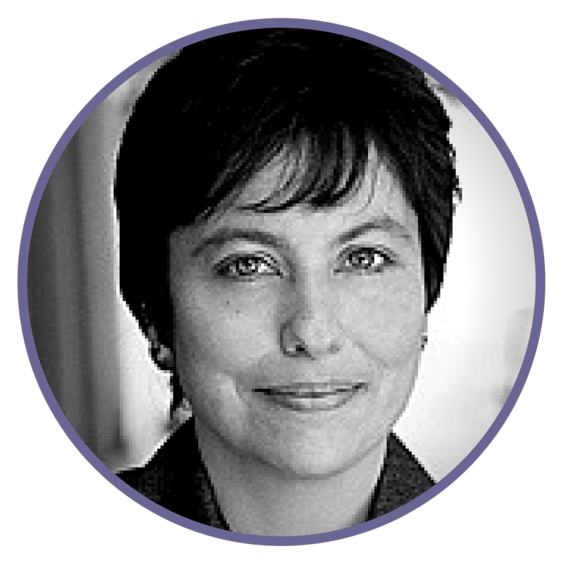 Black-and-white portrait photograph of a woman with short dark hair, smiling, with a blurred background.