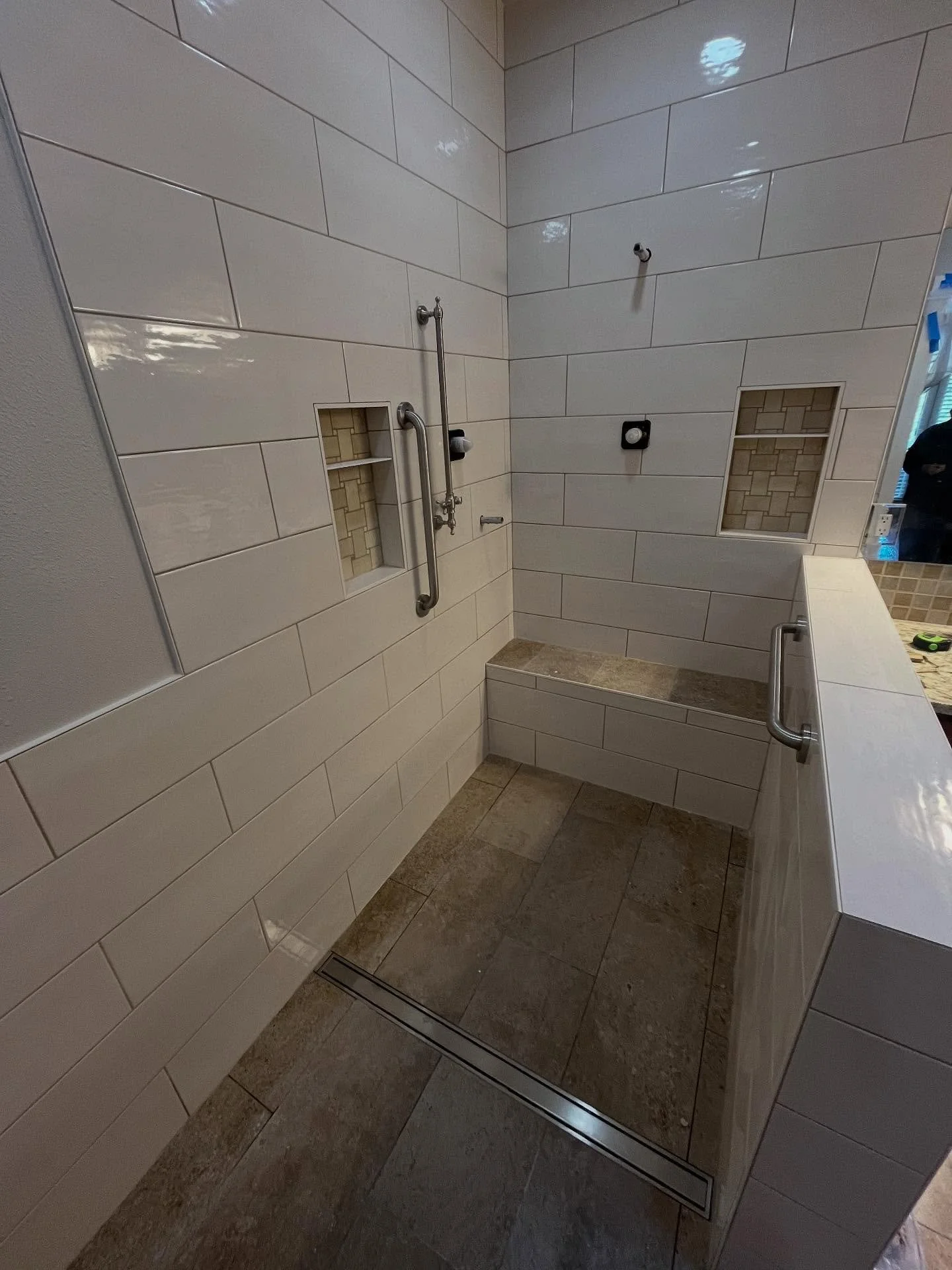 Waiting for plumbing and glass panel, but this clients vision for their ADA compliant shower really came together!

#missionscontracting#adacompliant#lineardrain#shower#boise#idaho#boisestate#goals generalcontractor#tile#curblessshower#master#bathroo
