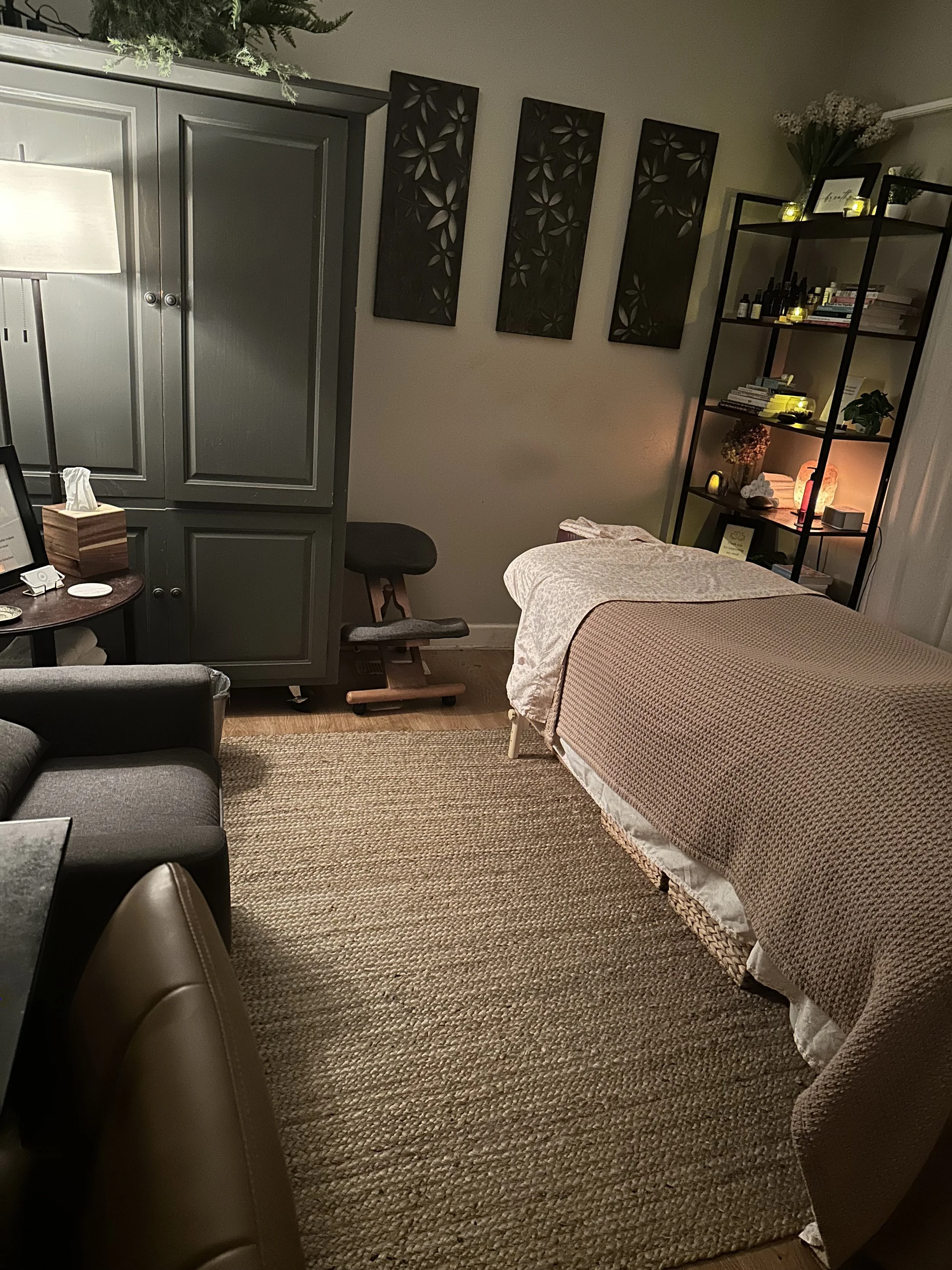Nichole Honeycutt Licensed Massage and Bodywork Therapist, comfortable and therapeutic massage treatment room designed for relaxation, stress relief, and pain management in Durham, NC