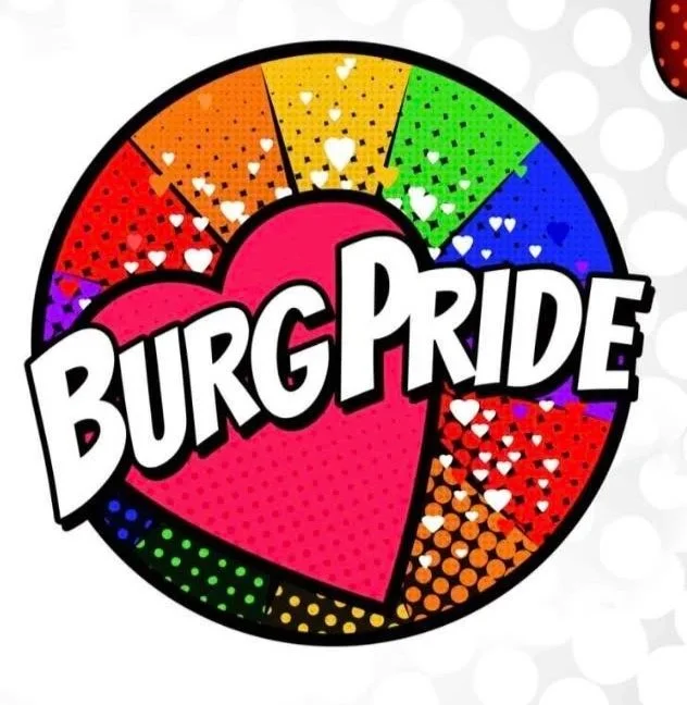 Colorful circular badge with rainbow sections and a pink heart at the center, featuring white text 'BURGPride' overlaid.