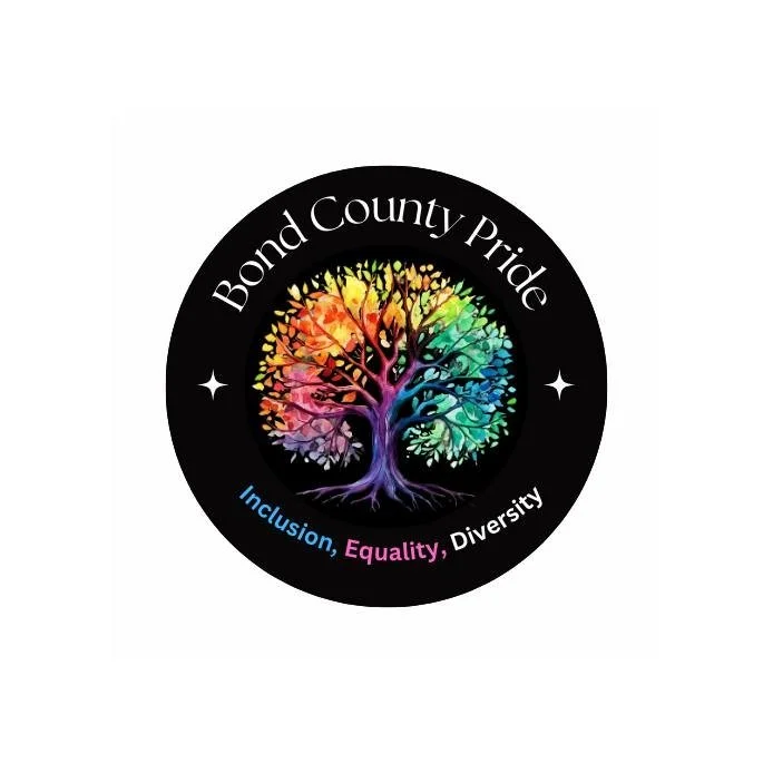 Logo for Bond County Pride featuring a rainbow-colored tree inside a black circle with the text 'Bond County Pride' and the words 'Inclusion, Equality, Diversity'.