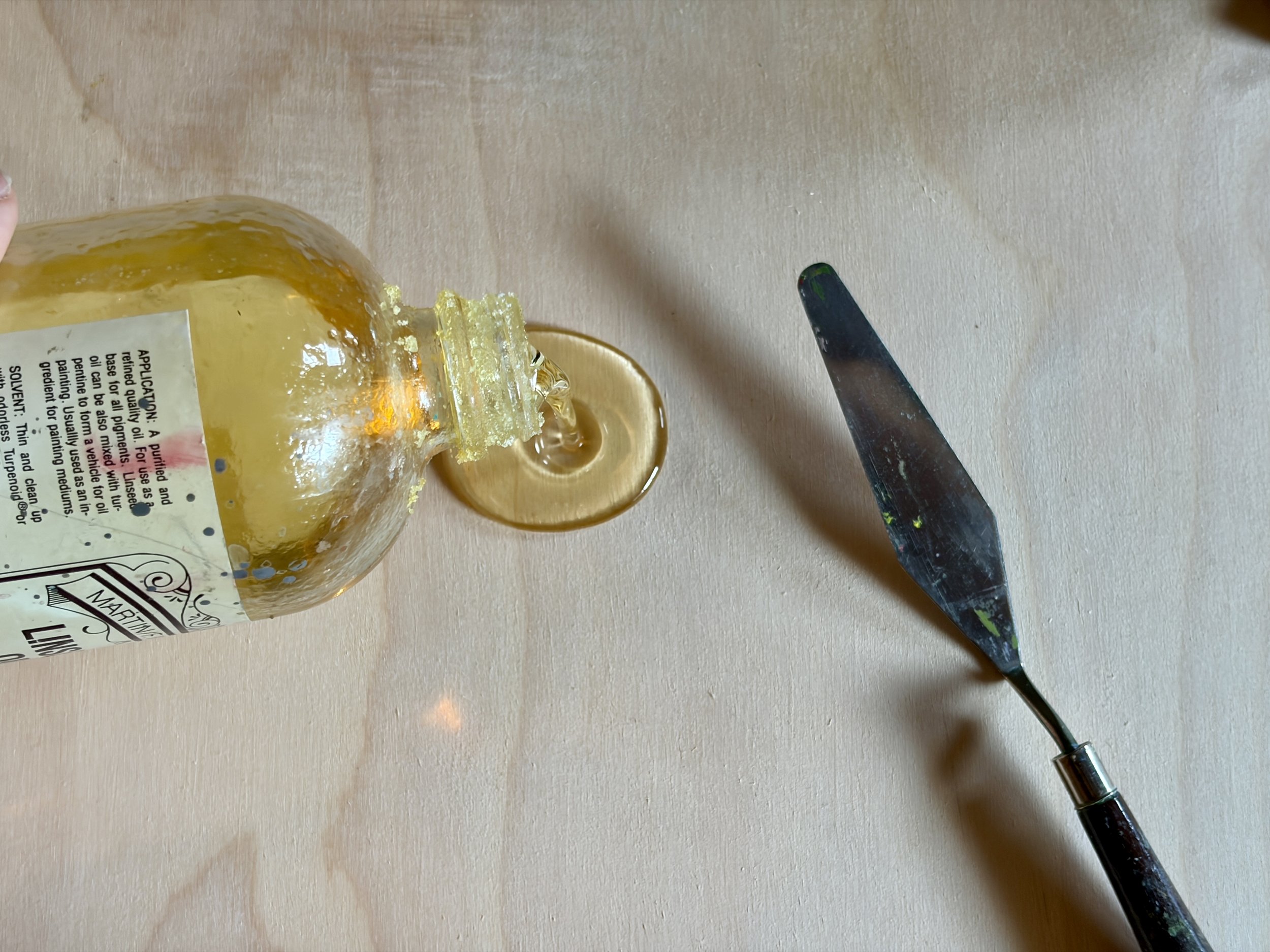 Pour a little linseed oil on your palette.