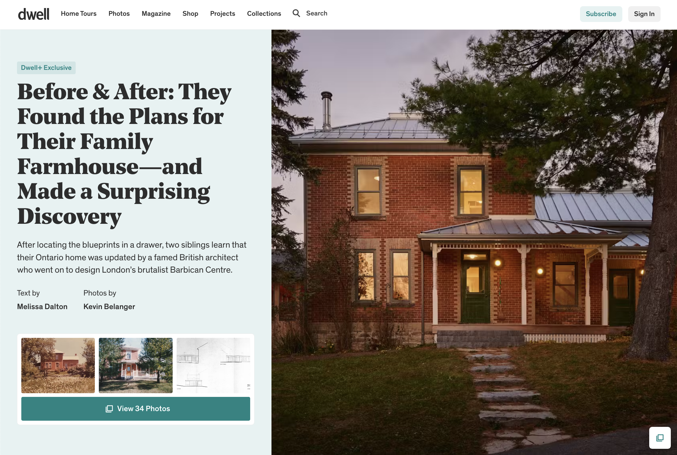 A brick farmhouse with a green front door, lit windows, a metal roof, and a stone pathway leading to the entrance, trees surrounding the house at dusk.