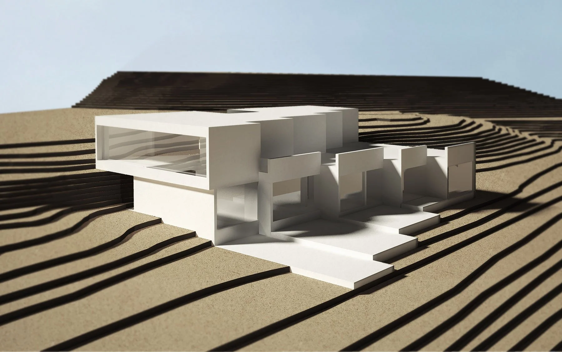 Architectural model of a modern house with multiple levels, set on a terrain with contour lines.