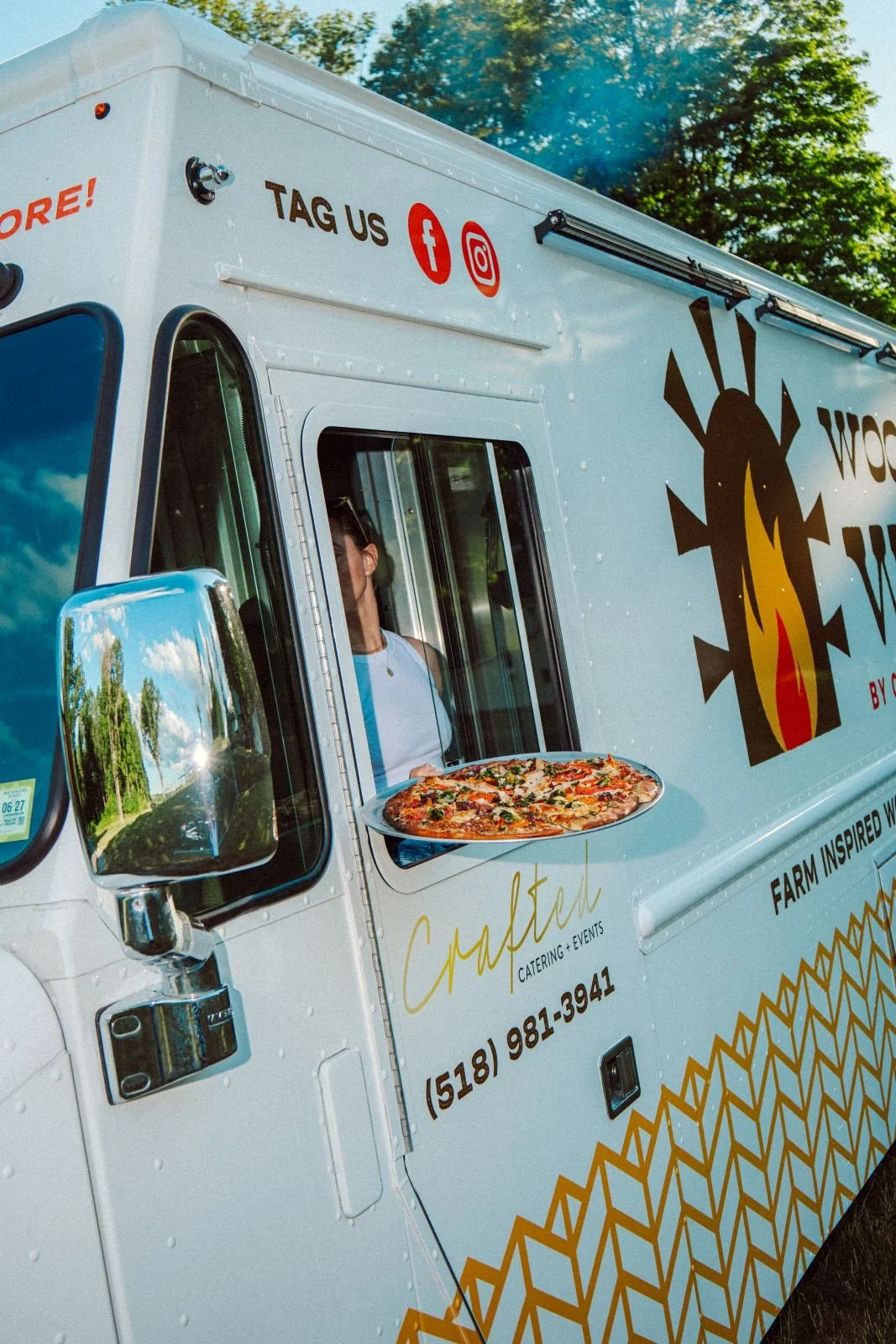Wood Fired Wagon food truck catering, serving wood fired pizza and locally sourced wood fired food. 