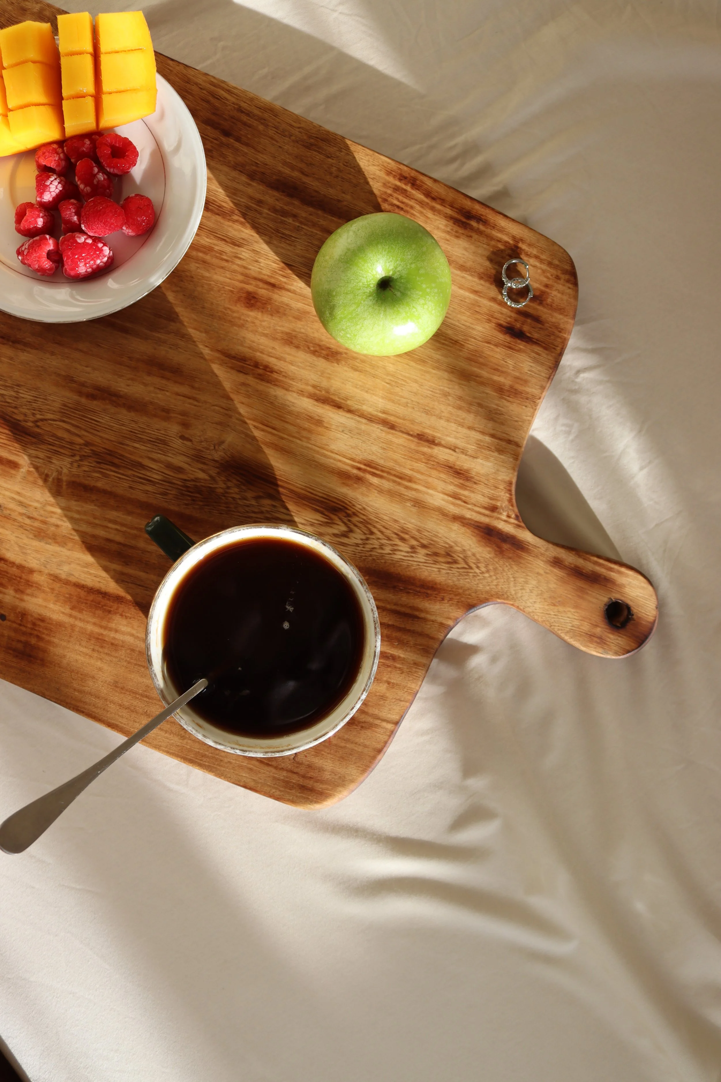 A cutting board made in collaboration with wood artisans in Nairobi, Kenya.