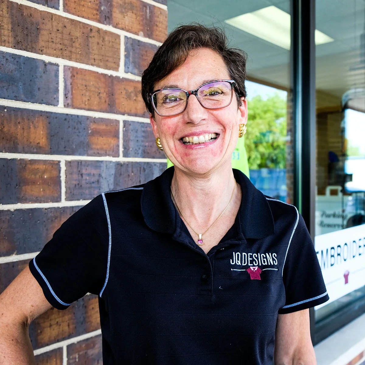 Janet Aldred, owner of JQ Promo, portrait photo.