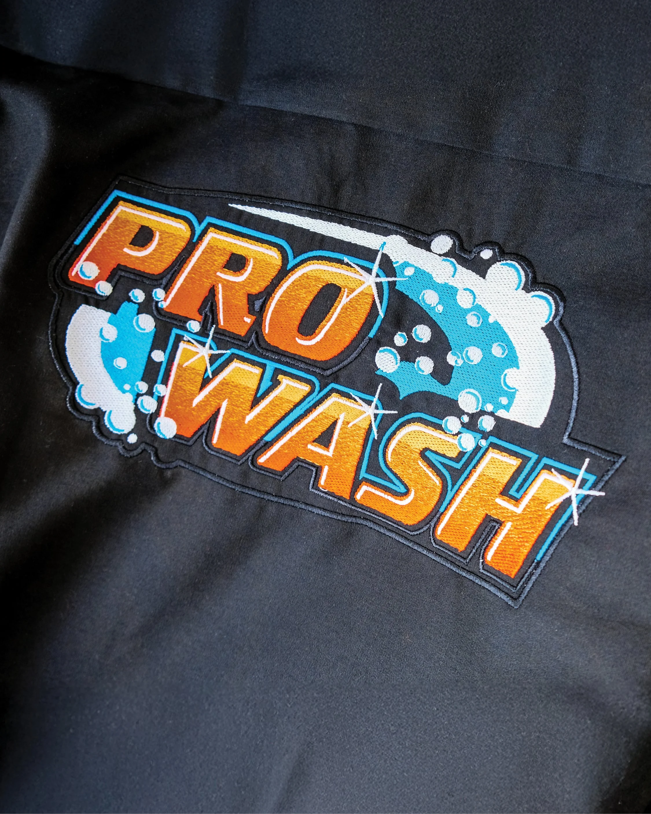 Custom branded apron embroidered by JQ Promo.