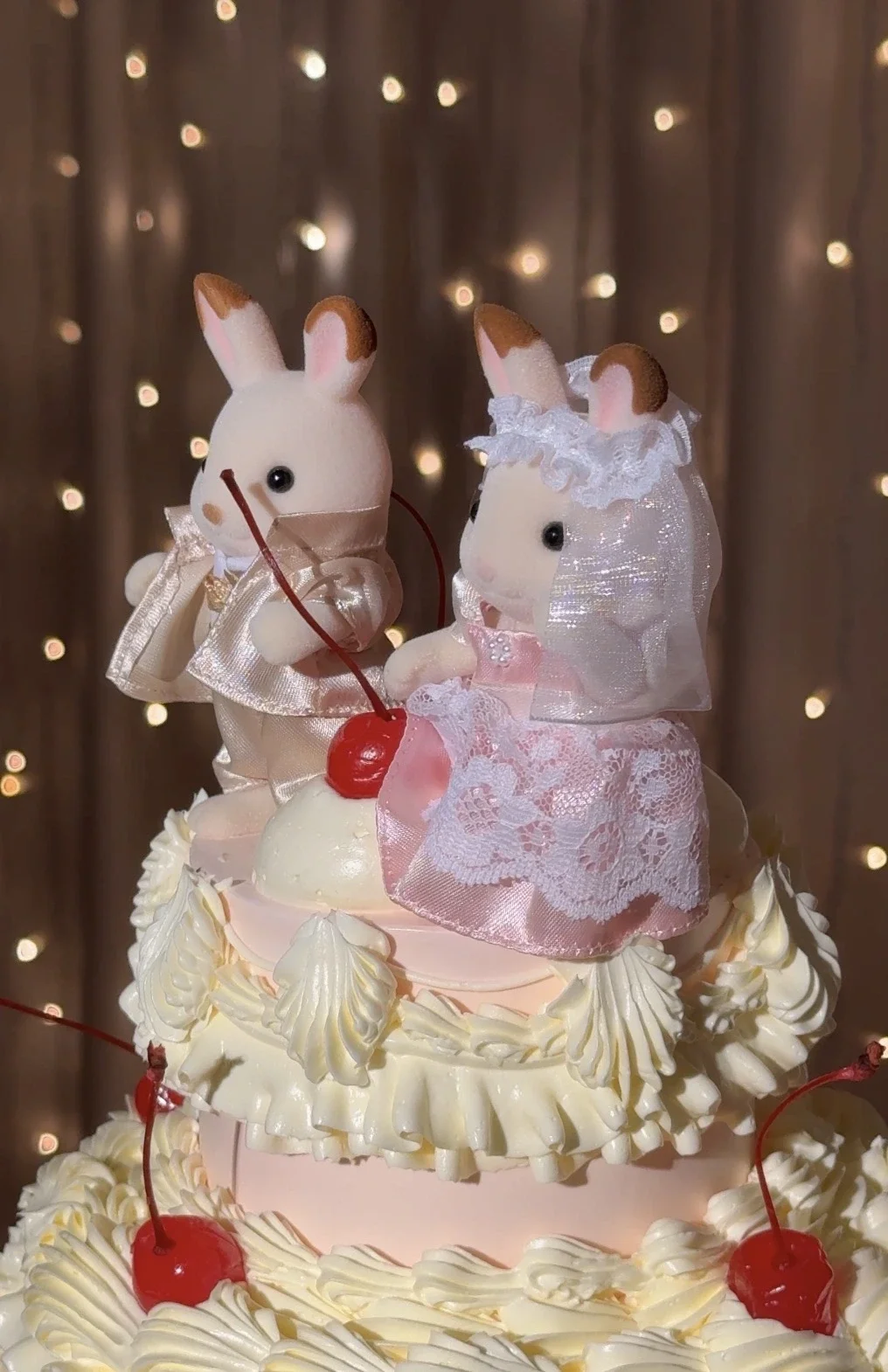 Pink wedding cake at a London wedding