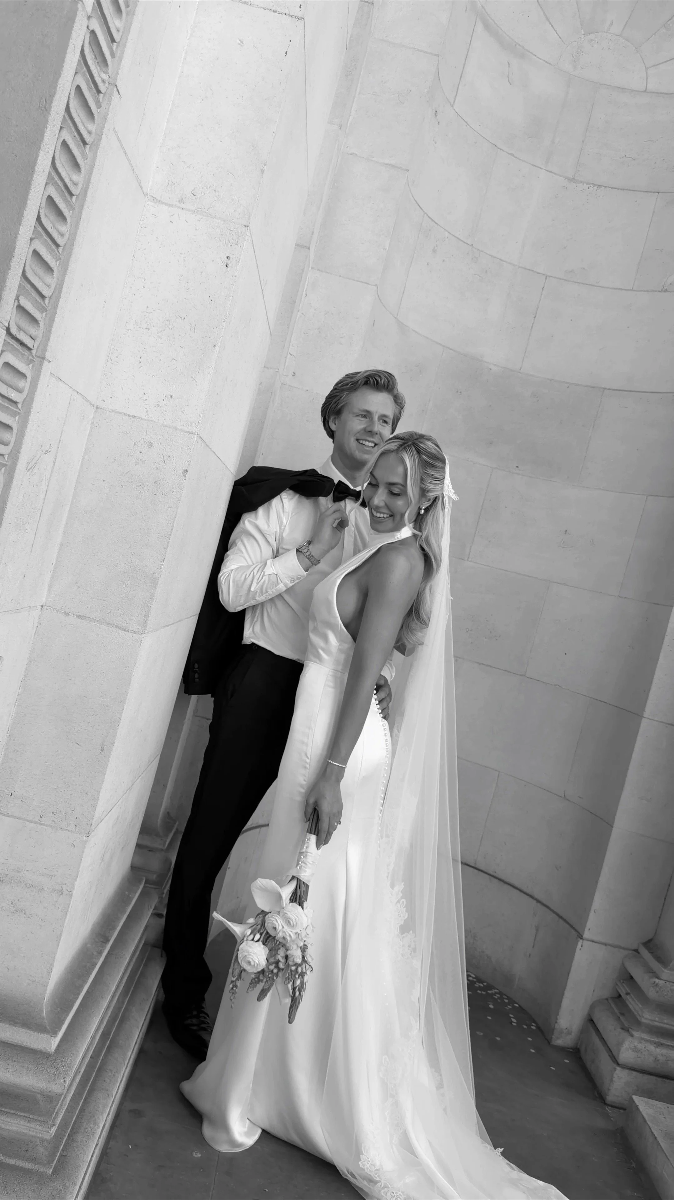 A bride and groom at the civil wedding at The Old Marylebone Town Hall London