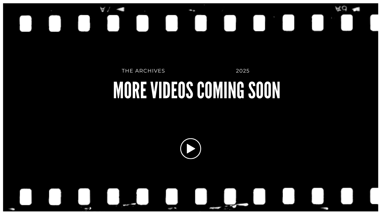 A black screen with white text that reads, "THE ARCHIVES 2025 MORE VIDEOS COMING SOON," with a play button icon in the center and a film strip border at the top and bottom.