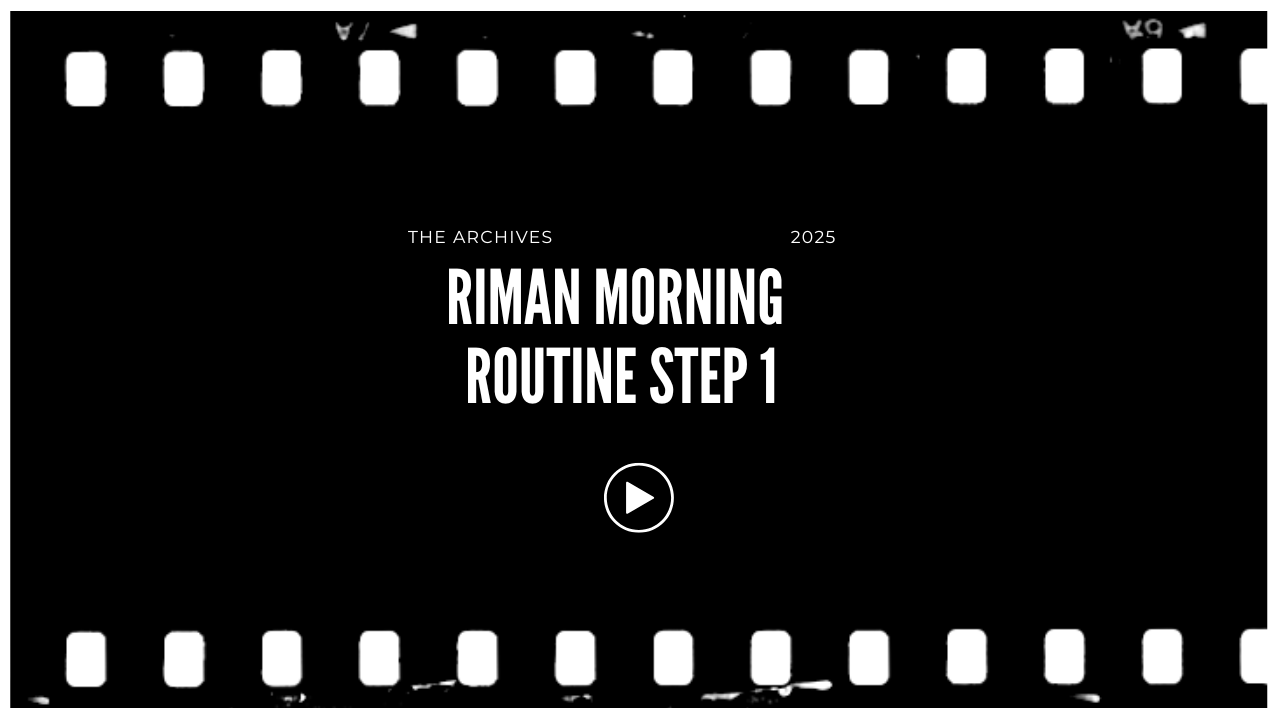 Screen displaying a black background with text saying "The Archives 2025 Riman Morning Routine Step 1" and a play button in the center, framed by a filmstrip border.