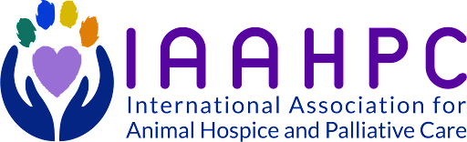 Logo of the International Association for Animal Hospice and Palliative Care, featuring a purple heart held by stylized blue hands with colorful paw prints above.