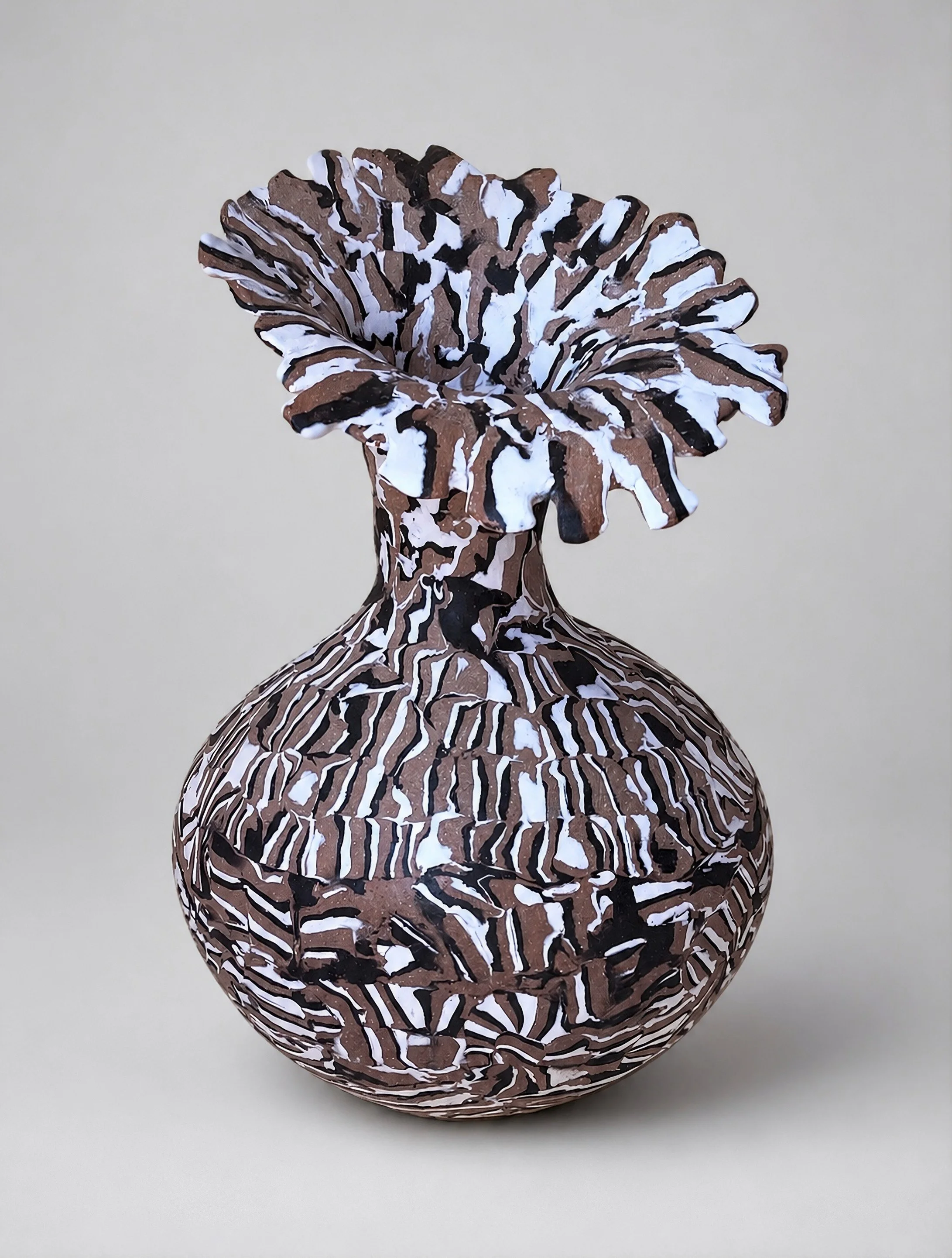* Title: uNtItLeD_I, @2021
* Medium: Layered clay (Porcelain, Stoneware, Earthenware)
* Size: 11.5" x 7" x 6"