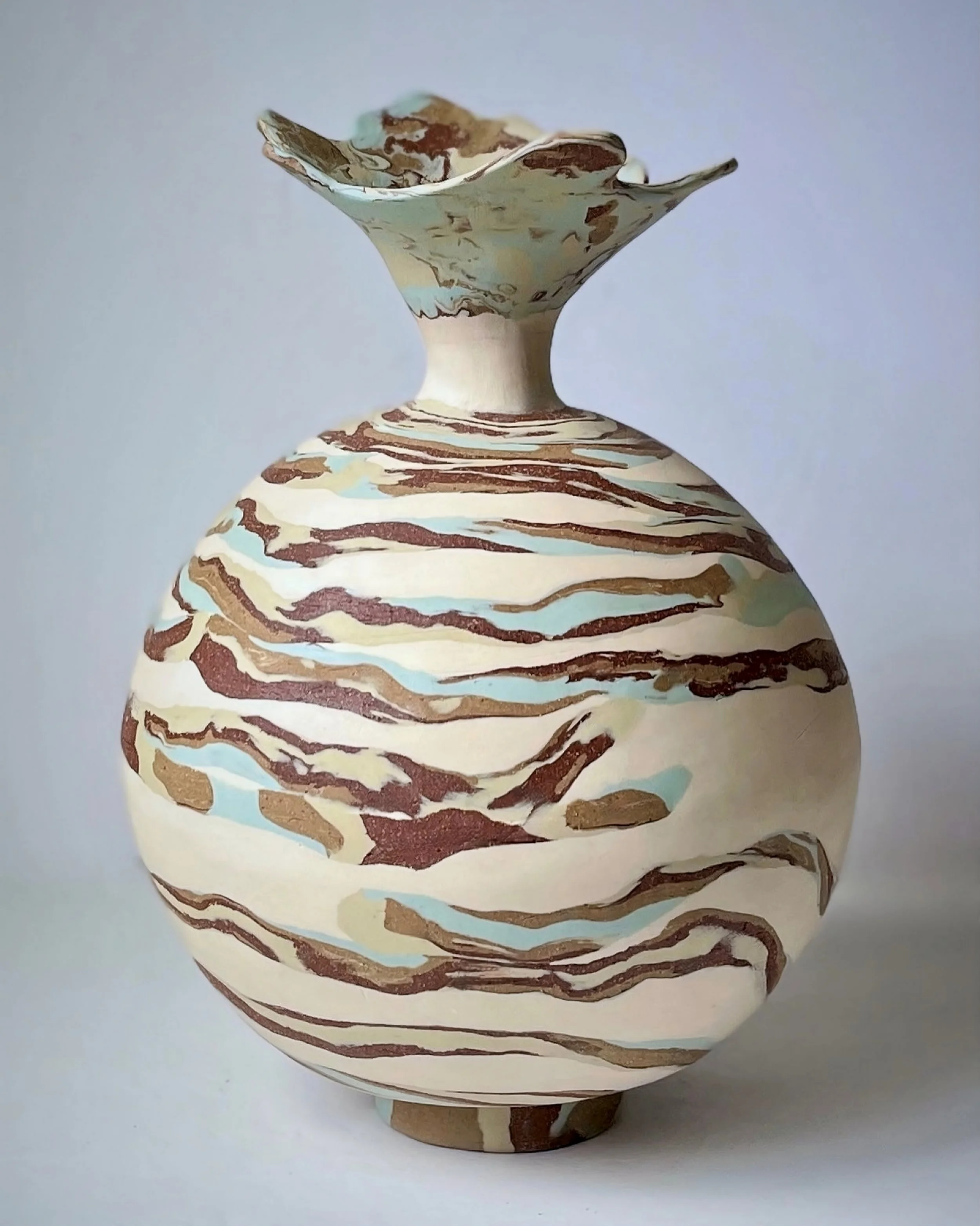 * Title: Lily_Of_The_Vallery, @2022 * Medium: porcelain, stoneware, Brooklyn red clay, blue and green pigments mixed with porcelain * Size: 11" x 8" x 8"