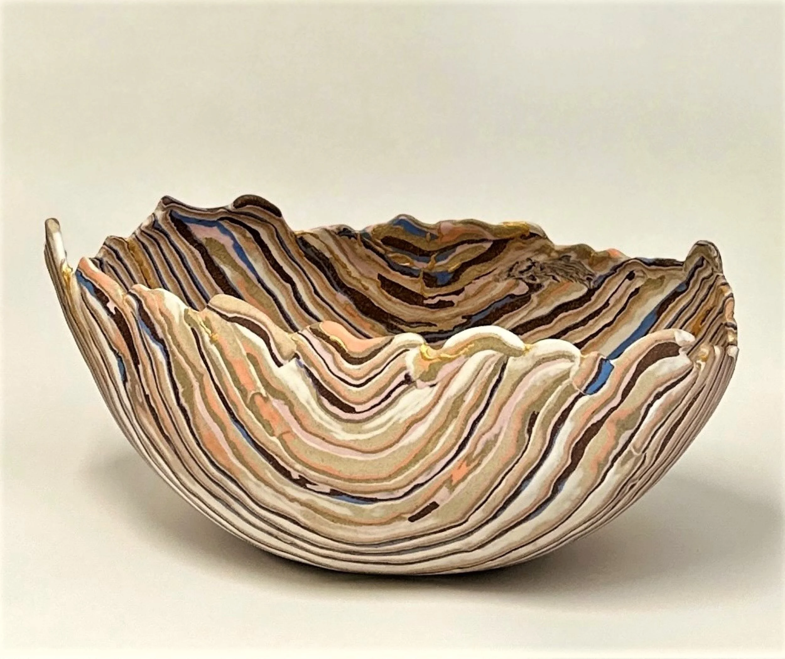 * Title: uNtItLeD_VII, 2023
* Medium:  Porcelain (213), blue, orange, and pink pigments, stonewares(192. 211), 308 Brooklyn red clay, mica powder mixed with food-safe resin, alternative gold powder and 23.4% real gold powder.
* Size : 9" x 8" x 16"