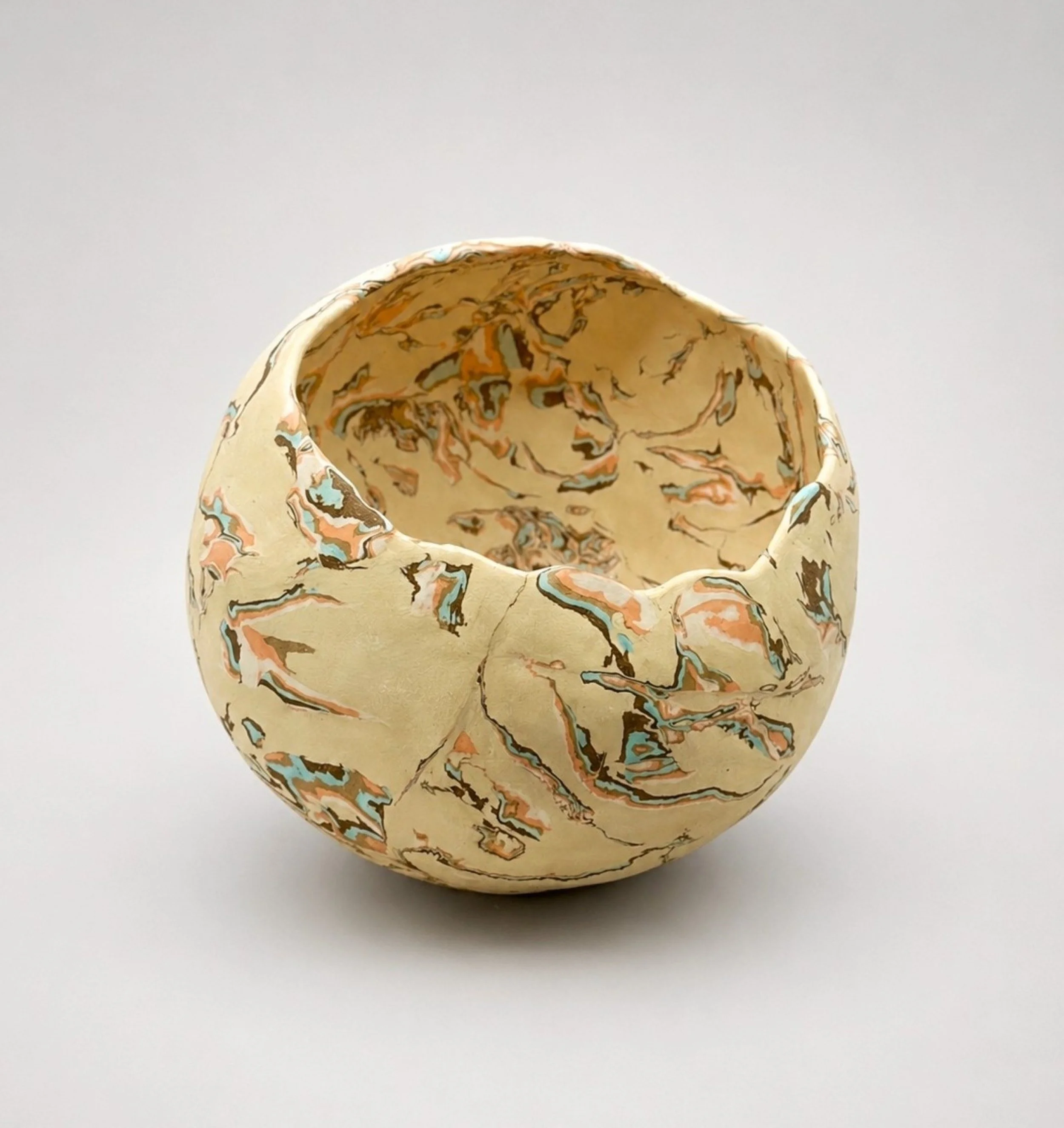 * Title: In_Becoming :: Held_Within, @2026 * Medium: White clay, Stonewares, color pigments  * Size: 9" x 7" x 8"