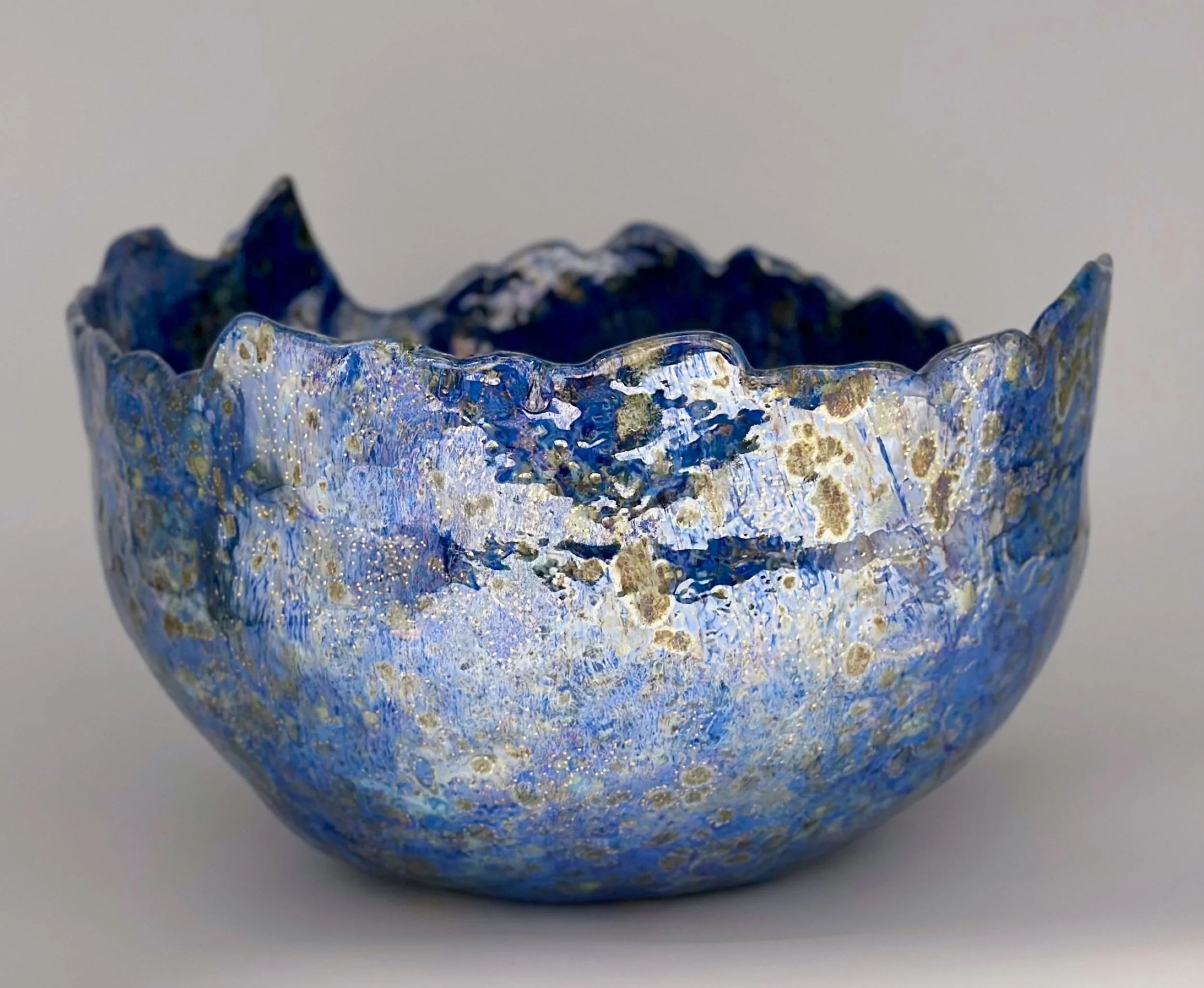 * Title: uNtItLeD_XIIII, 2024
* Medium: Blue porcelain, stoneware, crystal glaze, luster glaze
* Size: 8.5" x 13" x 13"