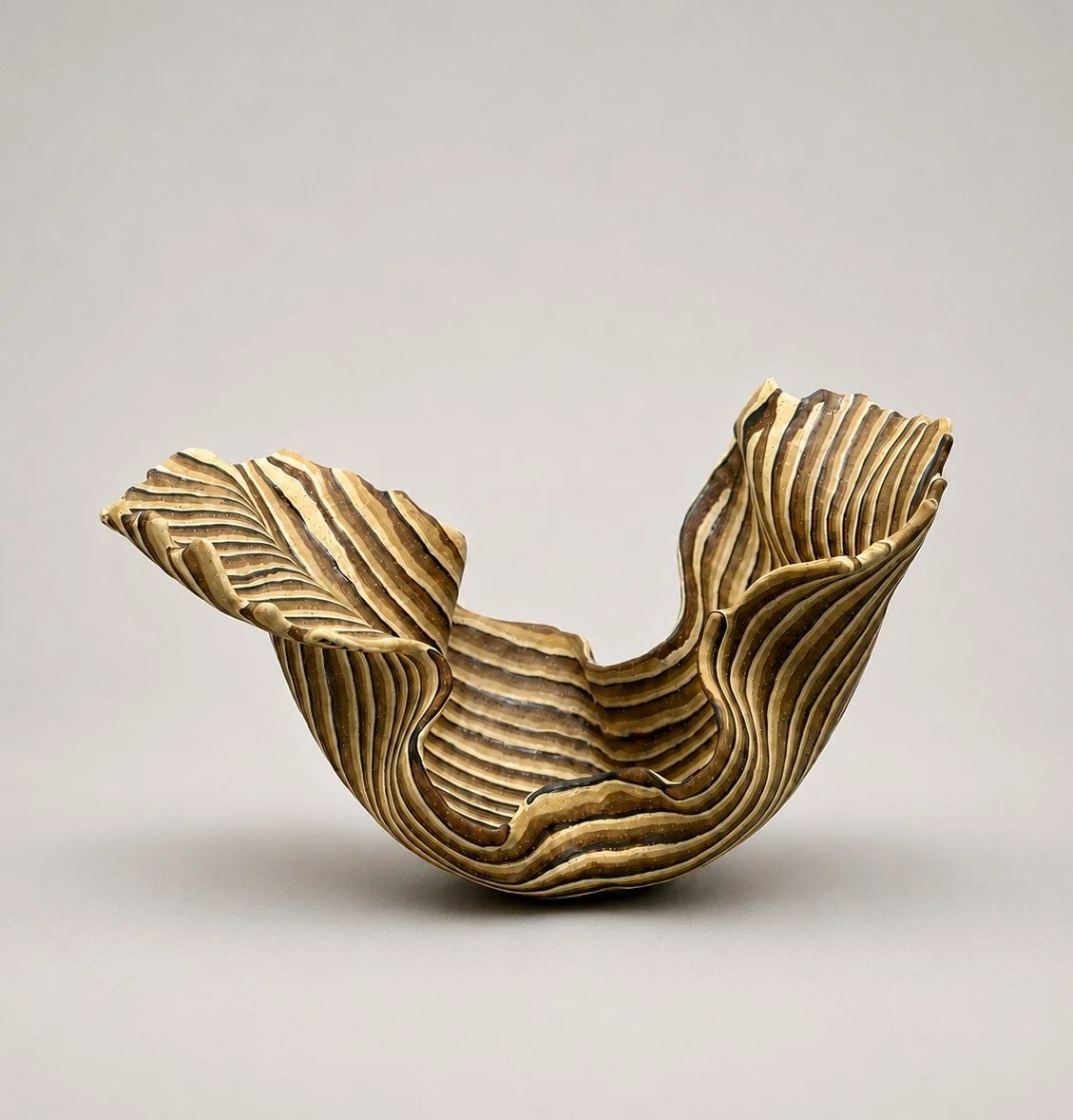 * Title: uNtItLeD_VIII.II, 2026  * Medium: Azabache LC 3, earthenware, stonewares  
* Size: 8" x 13" x 8"