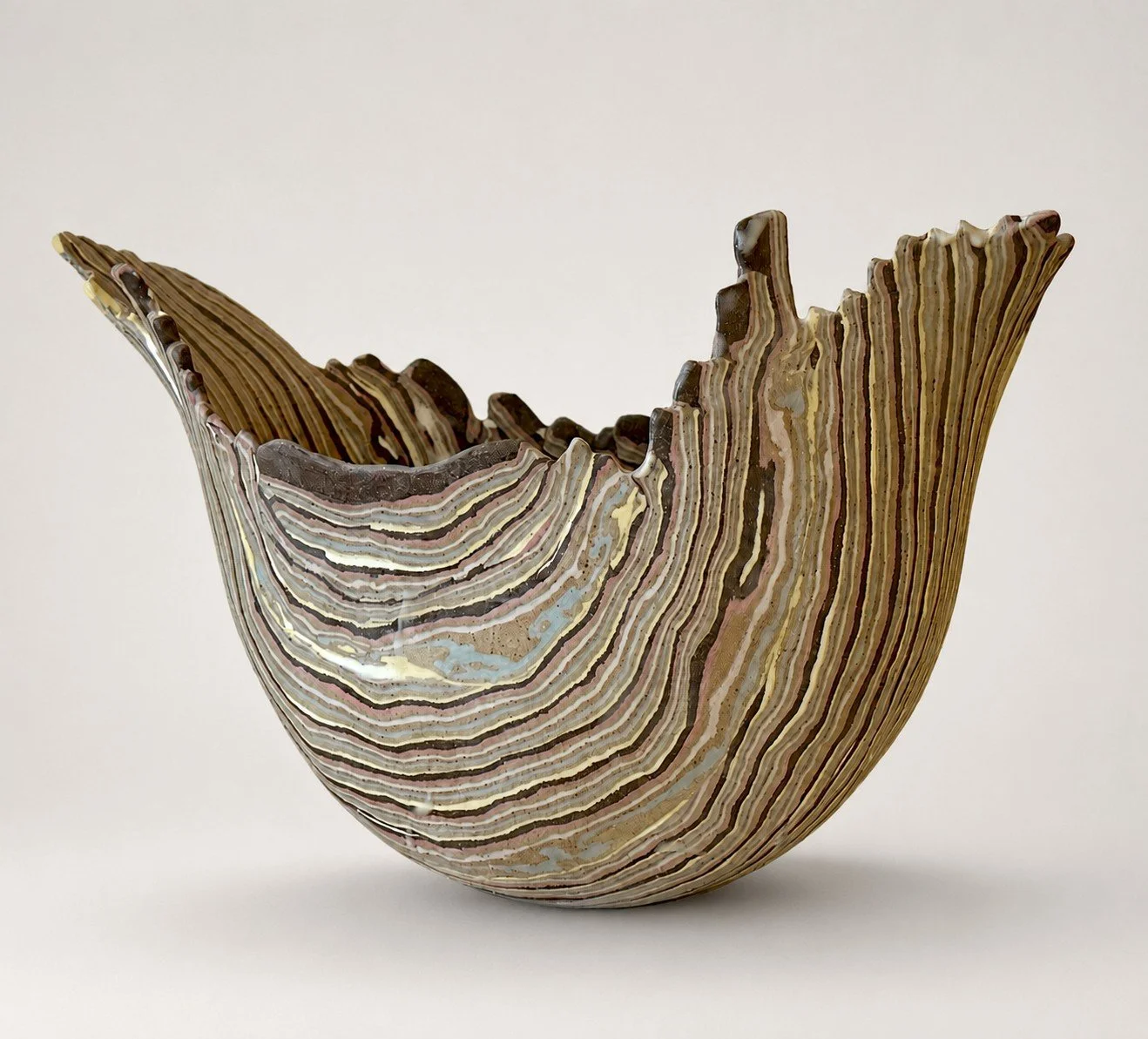 * Title: uNtItLeD_VIII, @2022
* Medium: Layered clay with Porcelain, Stoneware, Earthenware
* Size: 12.5" x 17" x 10" * This work is no longer available. Image included for portfolio documentation only.