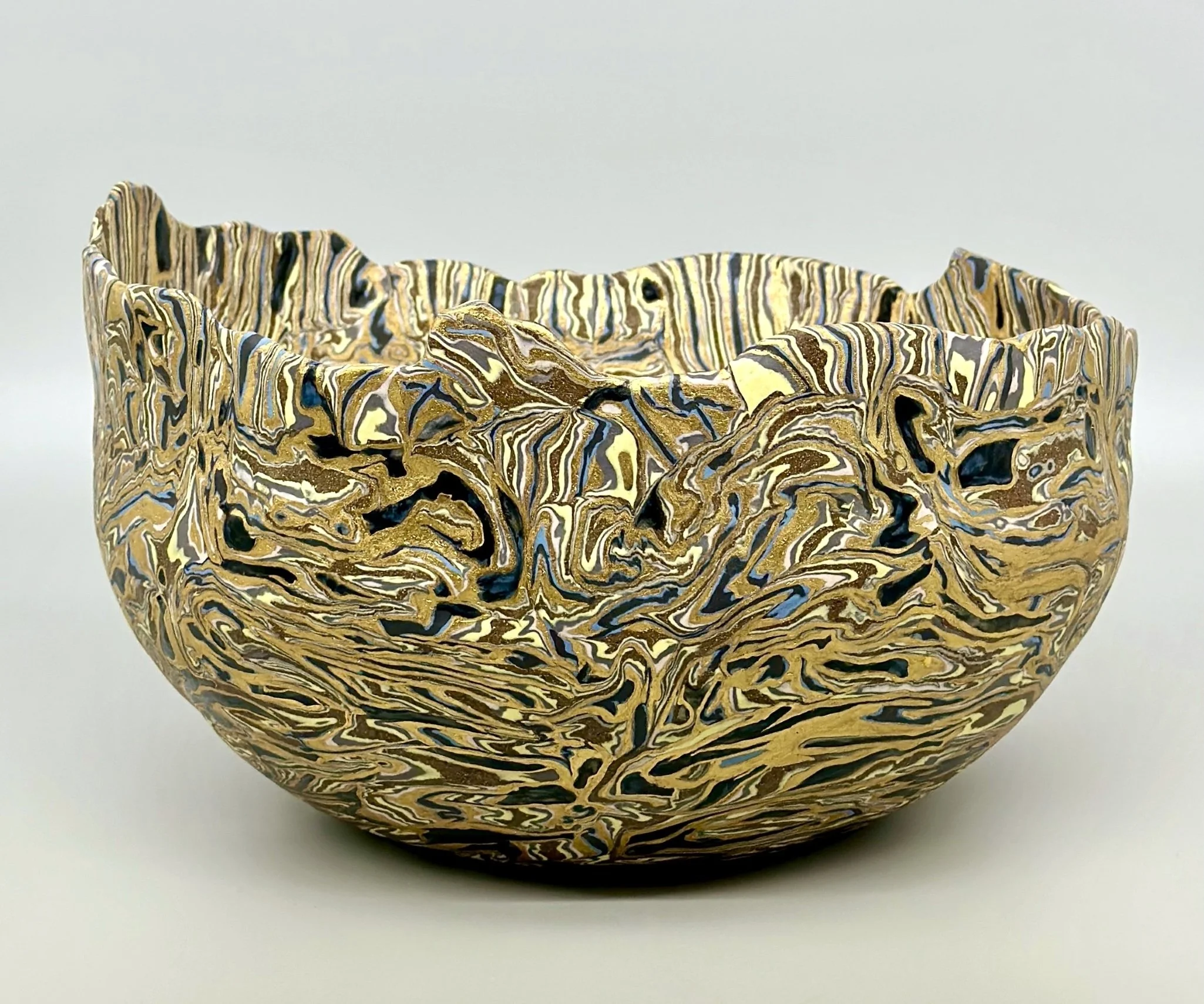 * Title: uNtItLeD_XII, 2023
* Medium: SiO-2 porcelain, stonewares, gold luster overglaze
* Size: 8" x 14" x 10"