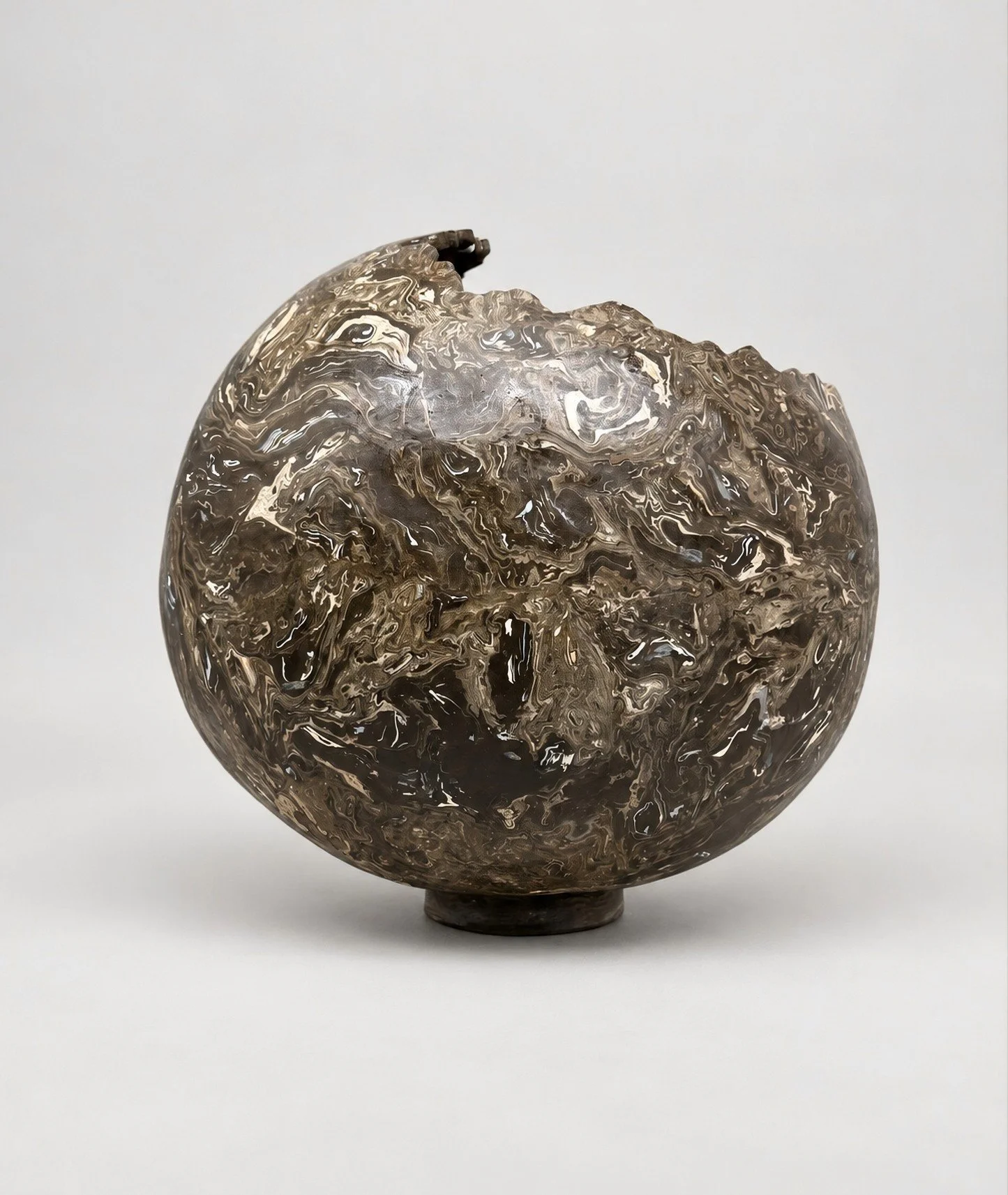 * Title:  In_Becoming_Holding_What_Remains, 2026                                                                           
* Medium: recycled Azabache LC3, color pigments mixed with porcelain, and stonewares * Size: 16" × 13" × 12"