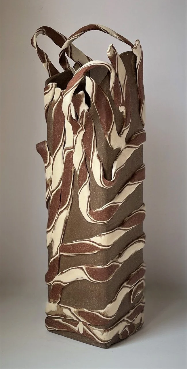 * Title: uNtItLeD_V, 2021
* Medium: Layered clay (Porcelain, Stoneware, Earthenware)
* Size: 18" x 5" x 5"