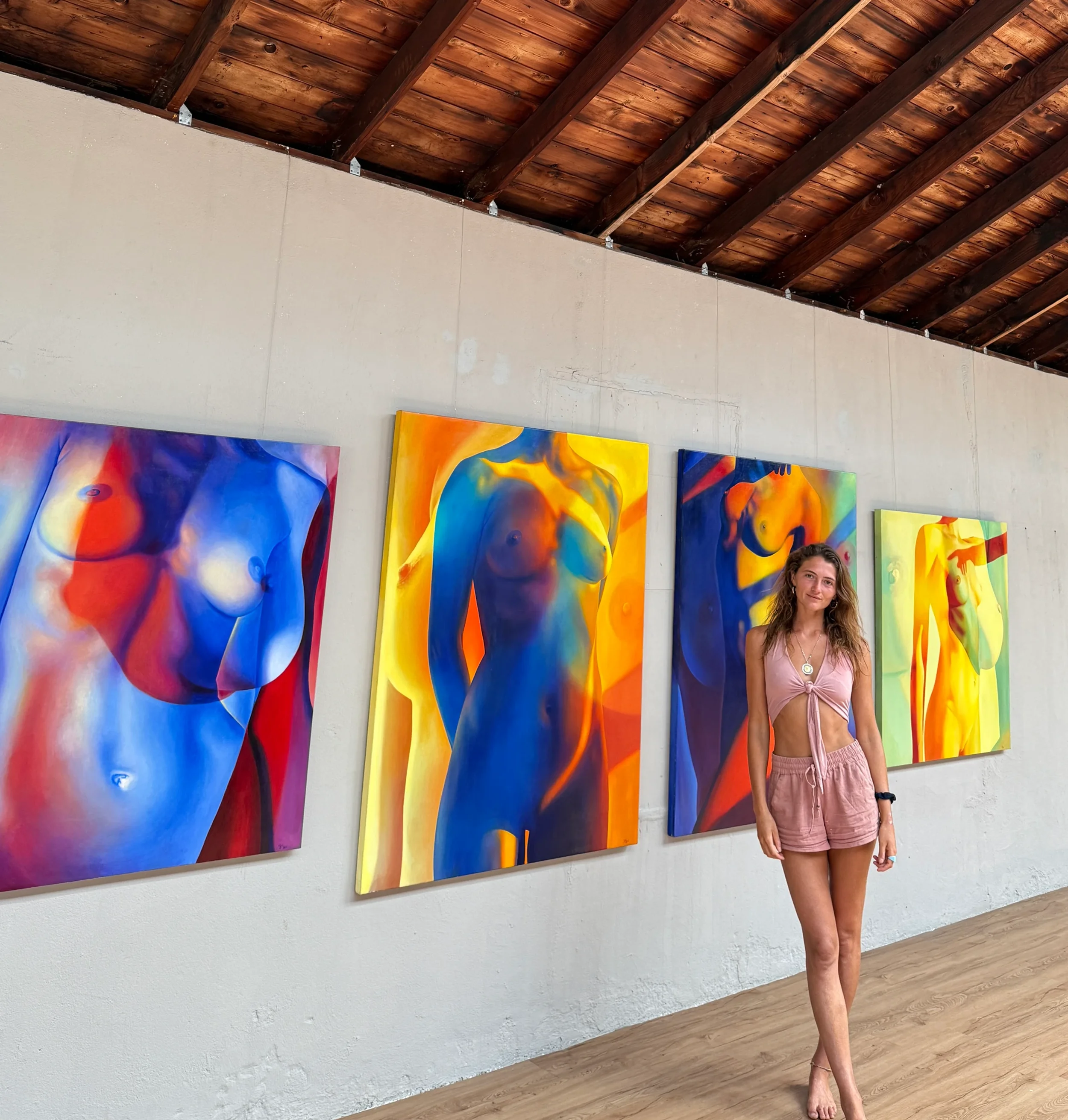 zoe rose and nude self portraits hung in gallery.webp